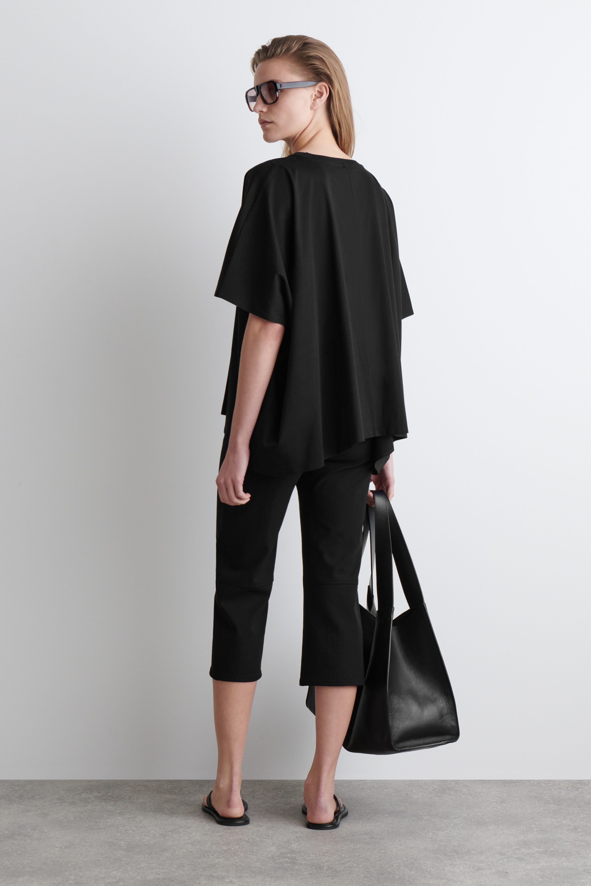 OVERSIZED BATWING-SLEEVE T-SHIRT - BLACK | COS