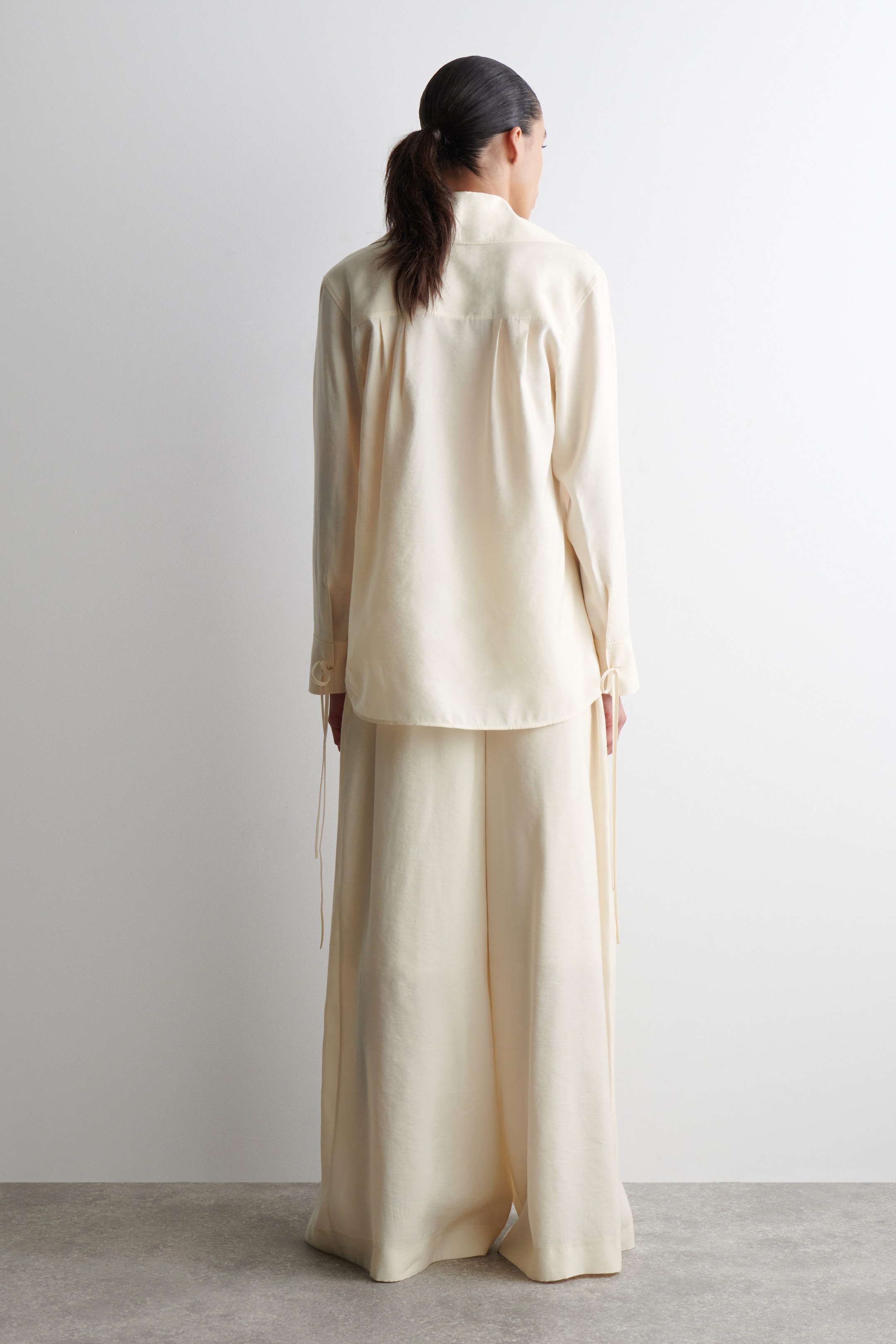 PLEATED MODAL WIDE-LEG TROUSERS