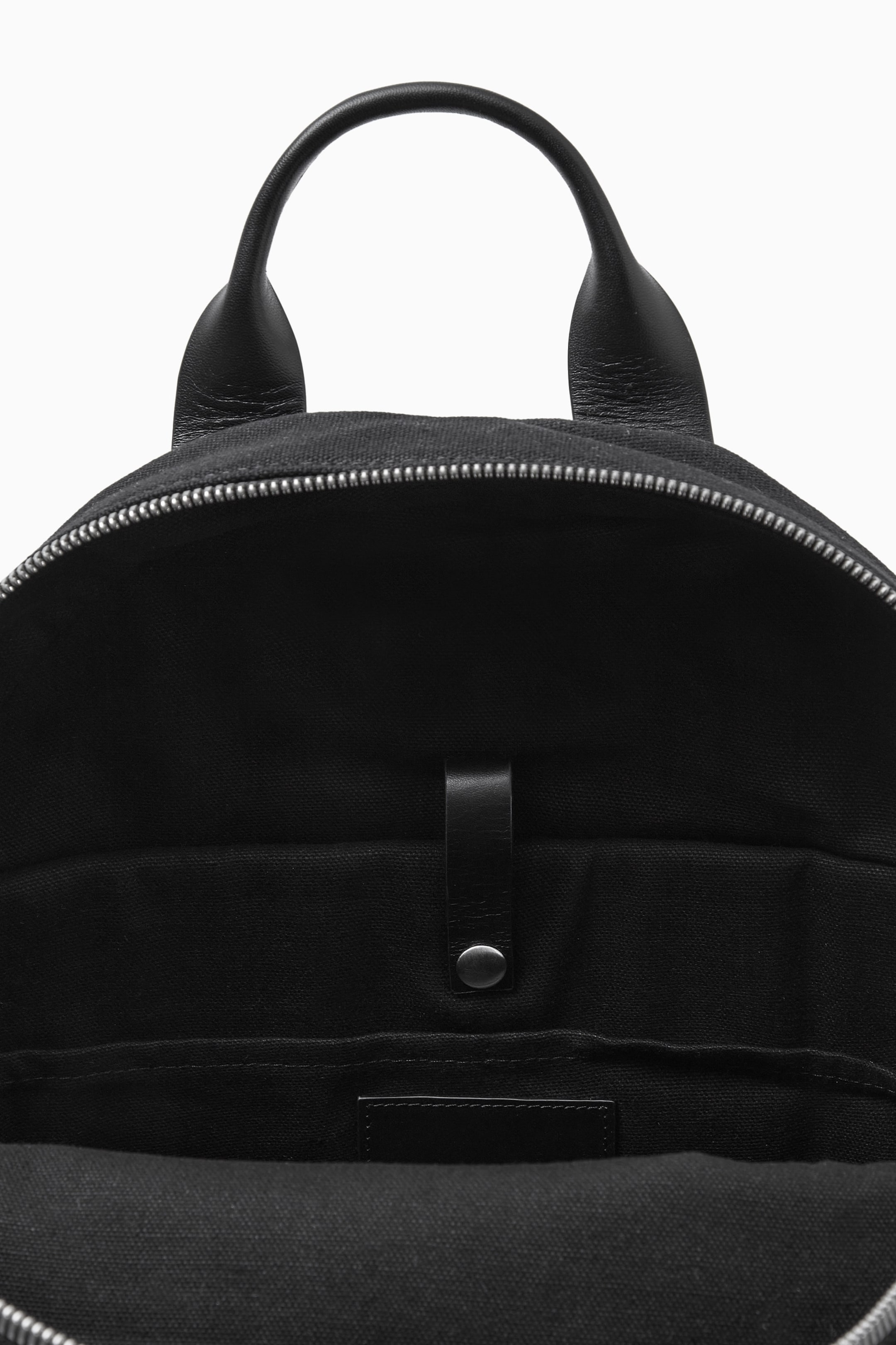 LEATHER-TRIMMED CANVAS BACKPACK