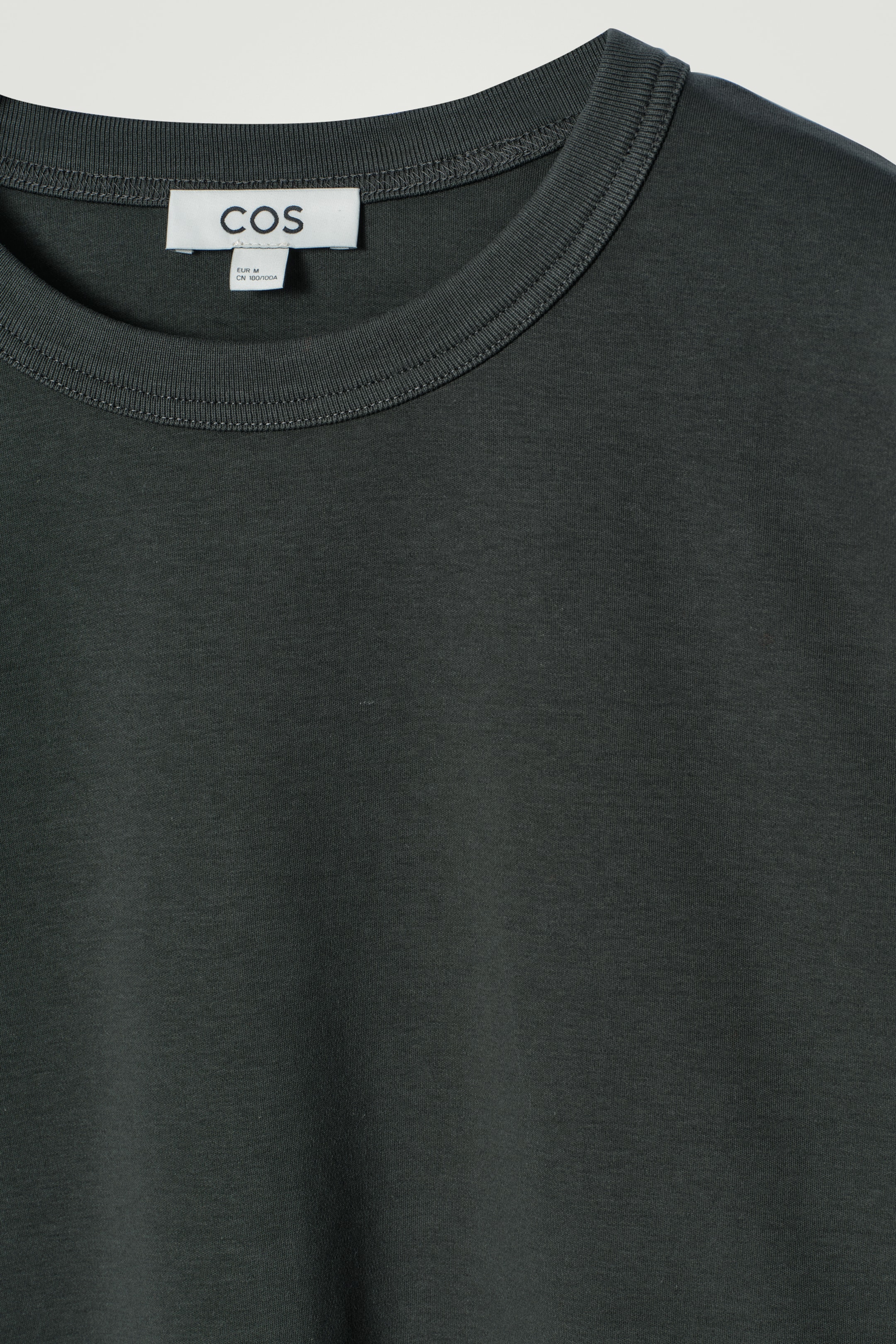 Grotere afbeelding bekijken: Relaxed jersey interlock T-shirt met lange mouwen - DONKERGROEN - HEREN | H&M BE 8