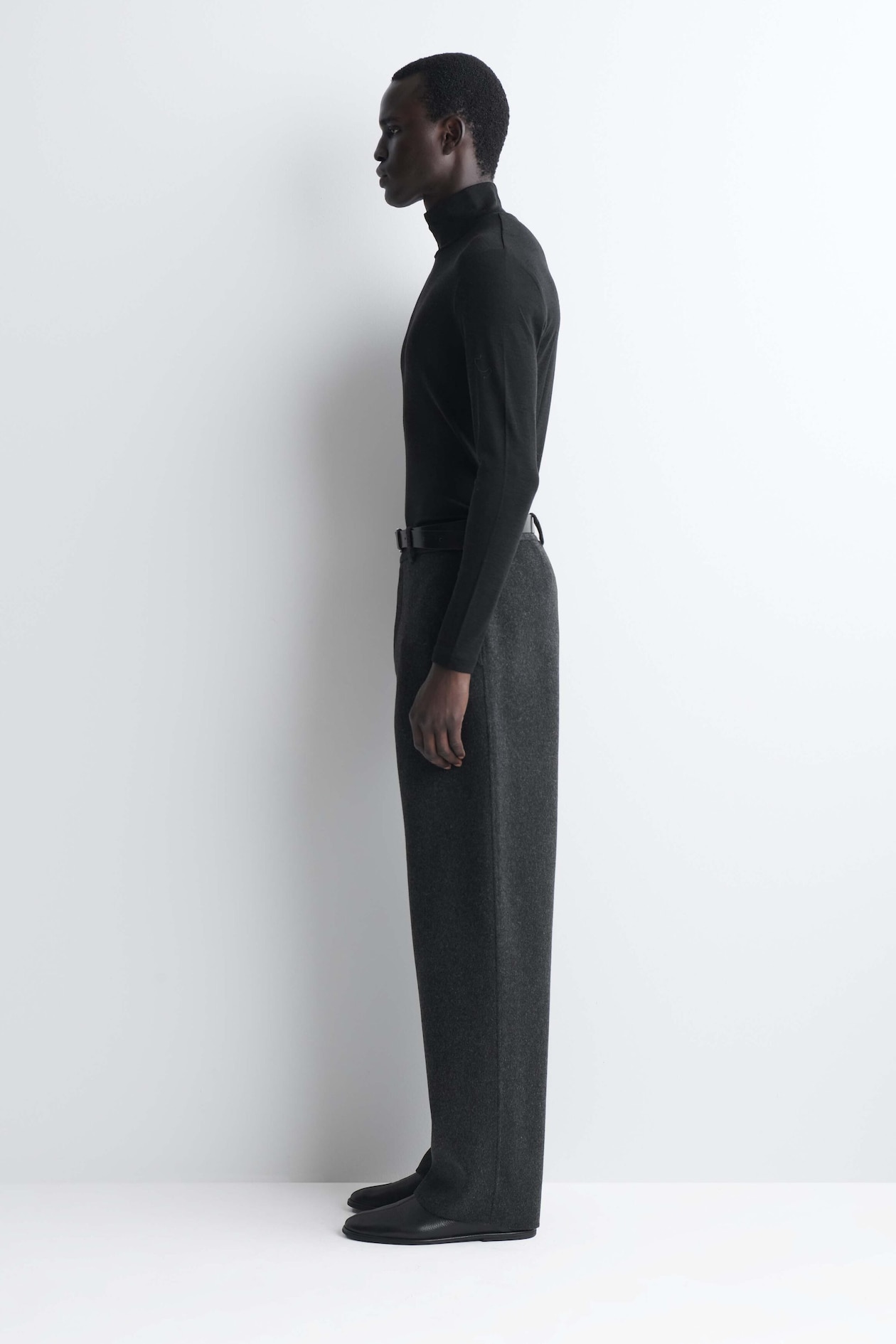 SLIM WOOL-JERSEY ROLLNECK TOP — BLACK
