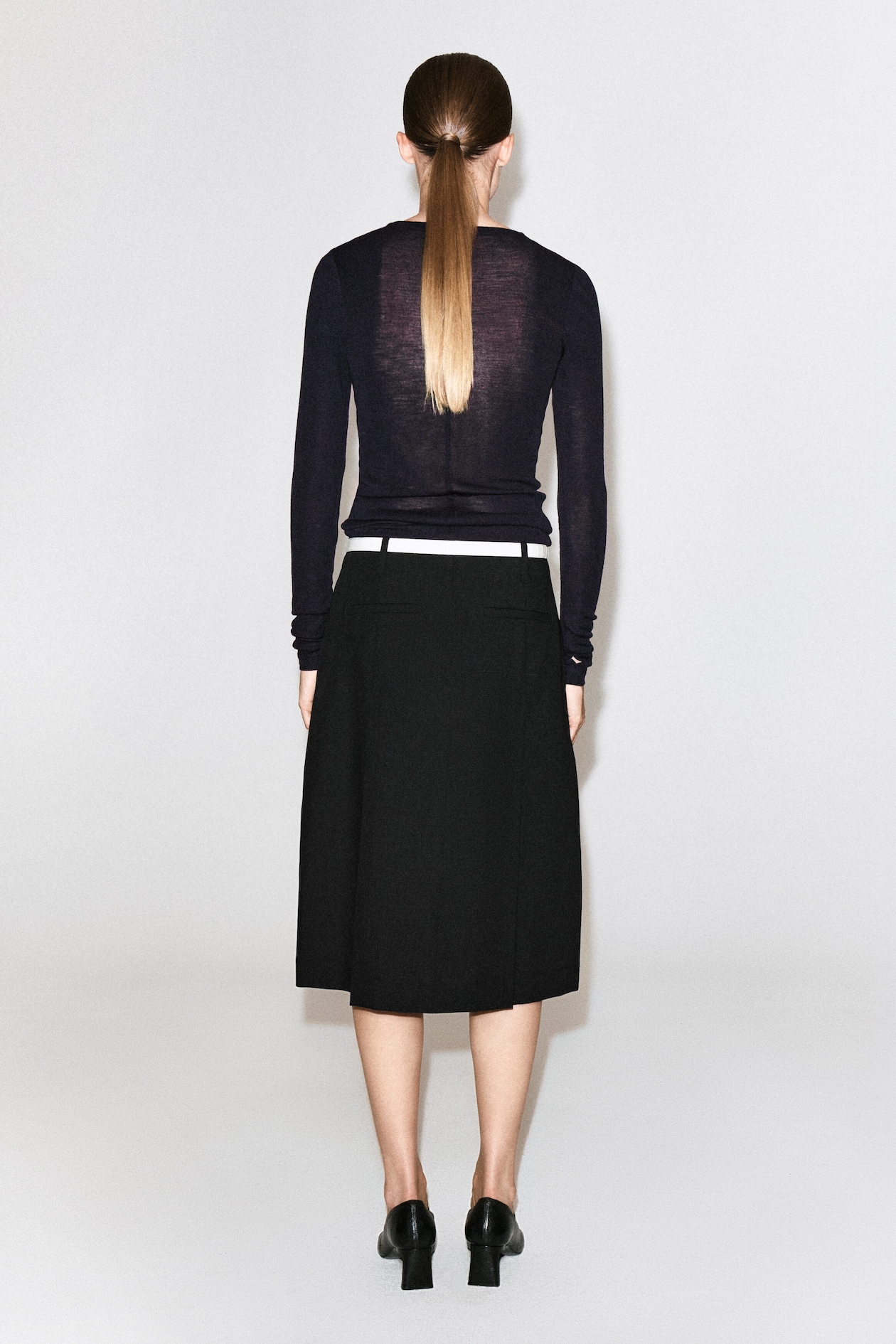 BOX-PLEAT WOOL MIDI SKIRT — BLACK