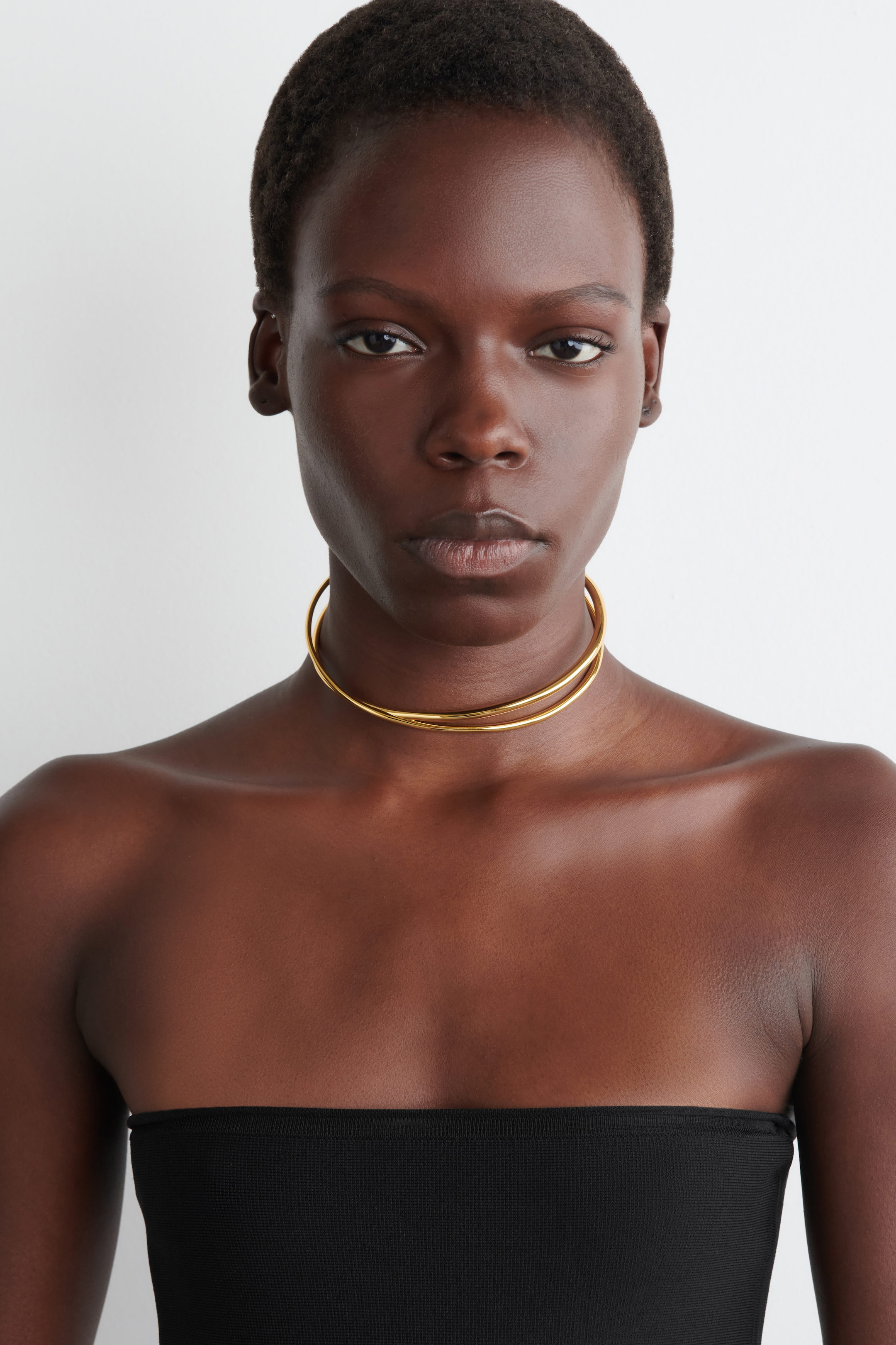 SHEER-DETAIL KNITTED PEPLUM TOP