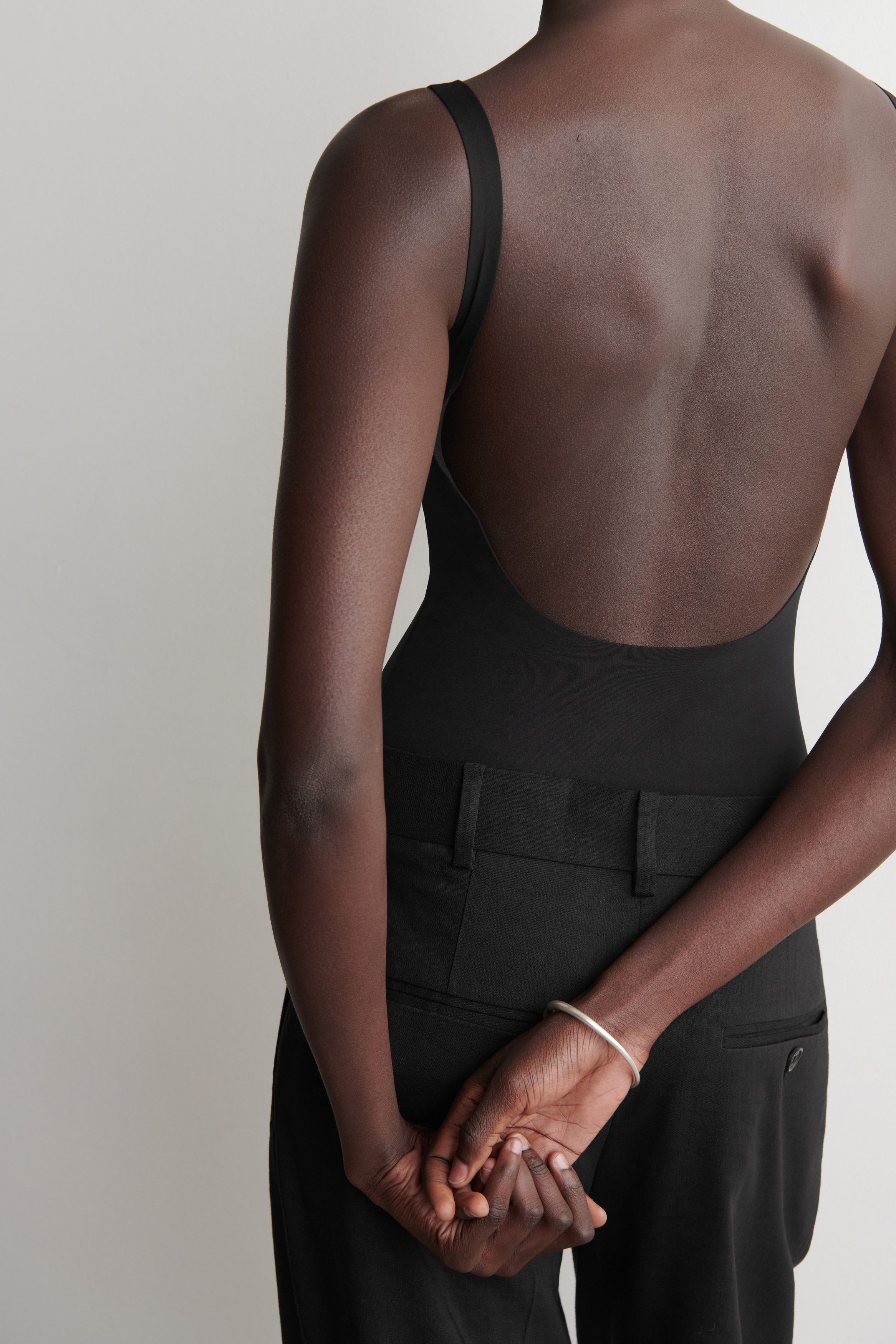INTERLOCK JERSEY BODYSUIT - BLACK | COS CA