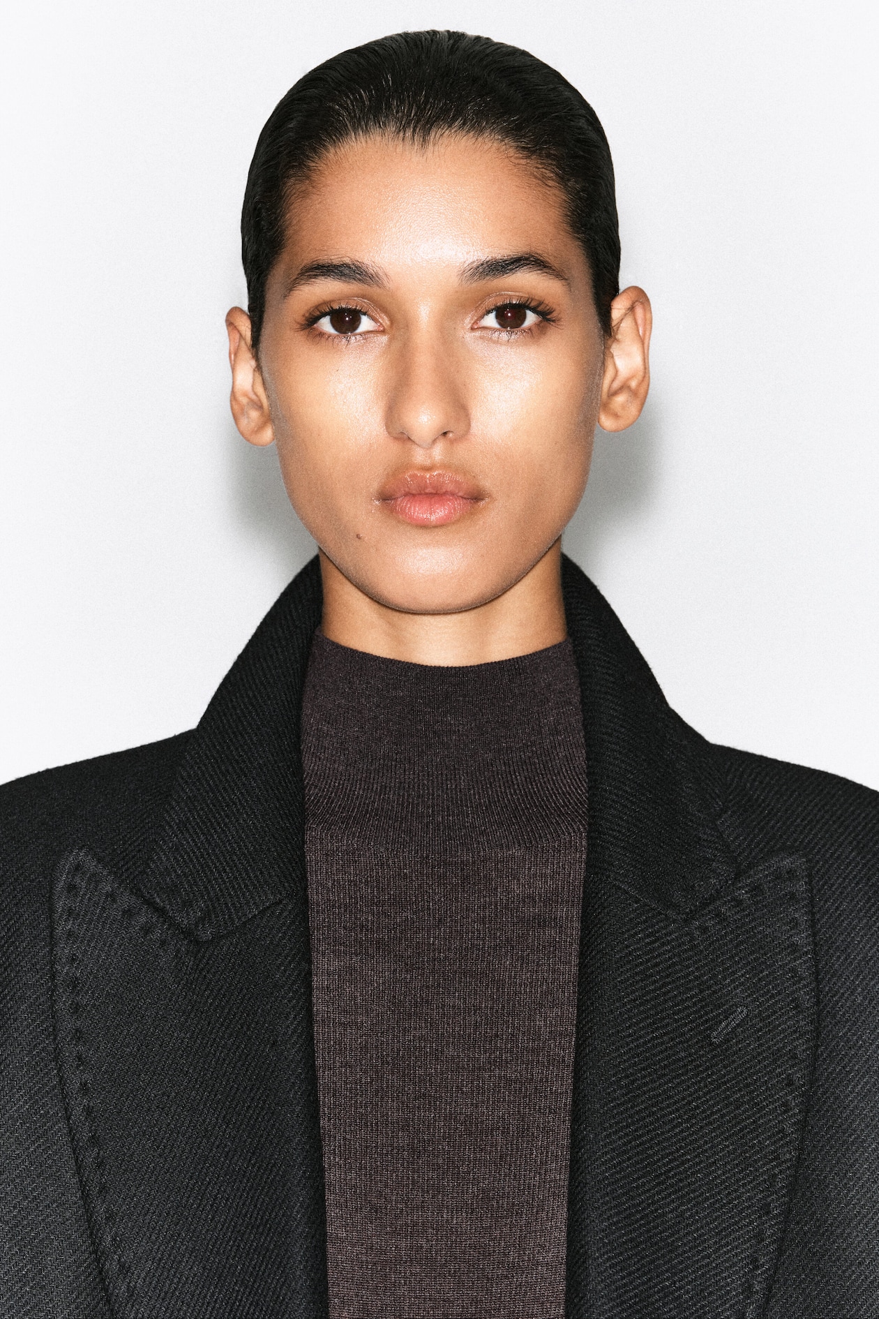 SEAMLESS MERINO WOOL MOCK-NECK BODYSUIT — BROWN MÉLANGE