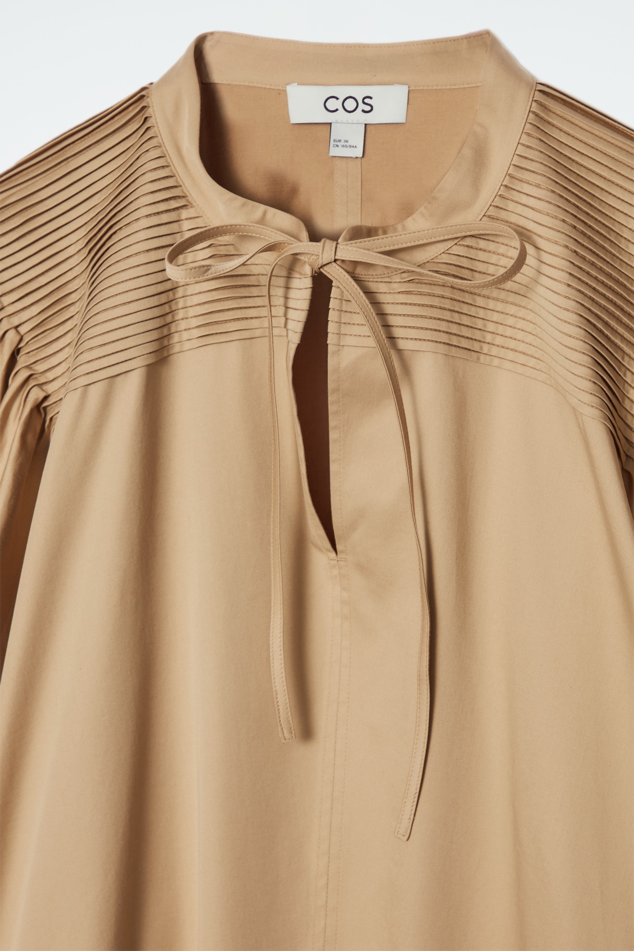 Grösseres Bild ansehen: MINIKLEID MIT PLISSEEFALTEN UND BINDEDETAIL - BEIGE - DAMEN | H&M CH 2