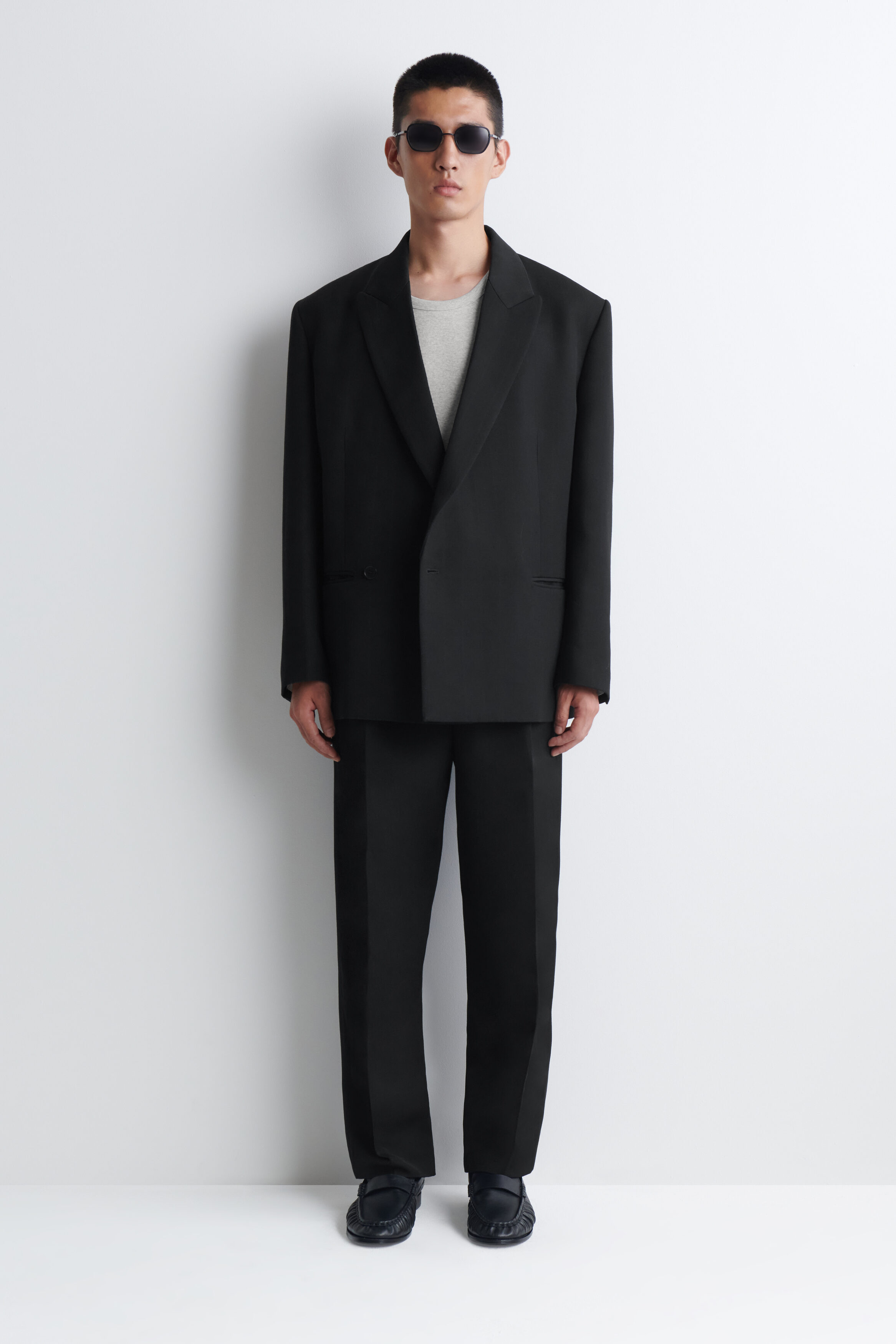 PLEATED WOOL-BLEND RELAXED-FIT TAPERED PANTS