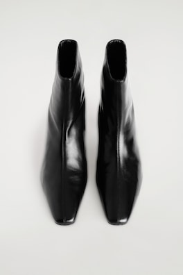 ANGULAR LEATHER HEELED ANKLE BOOTS — BLACK 1