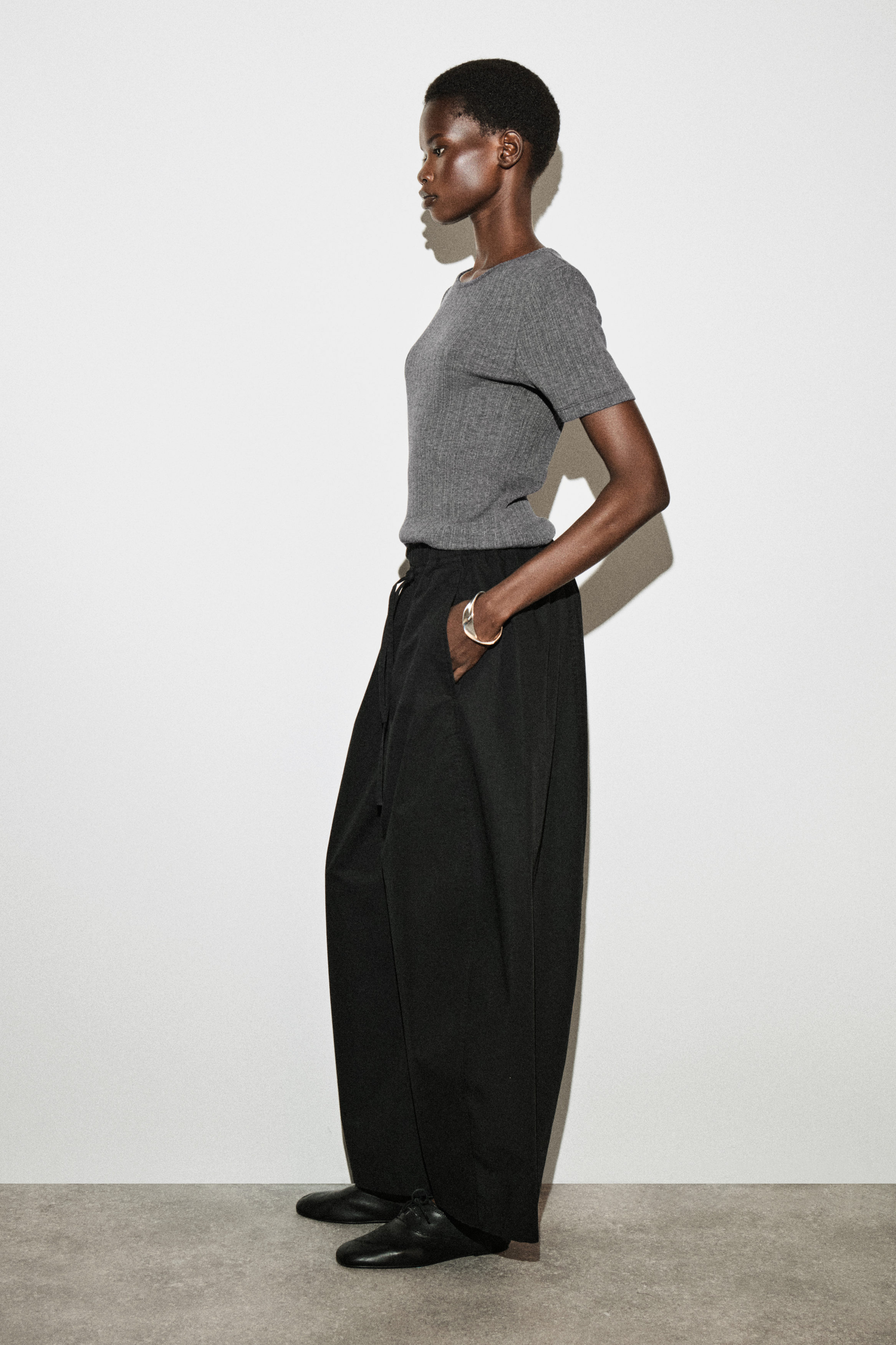 ELASTICATED BARREL-LEG PANTS - BLACK | COS US