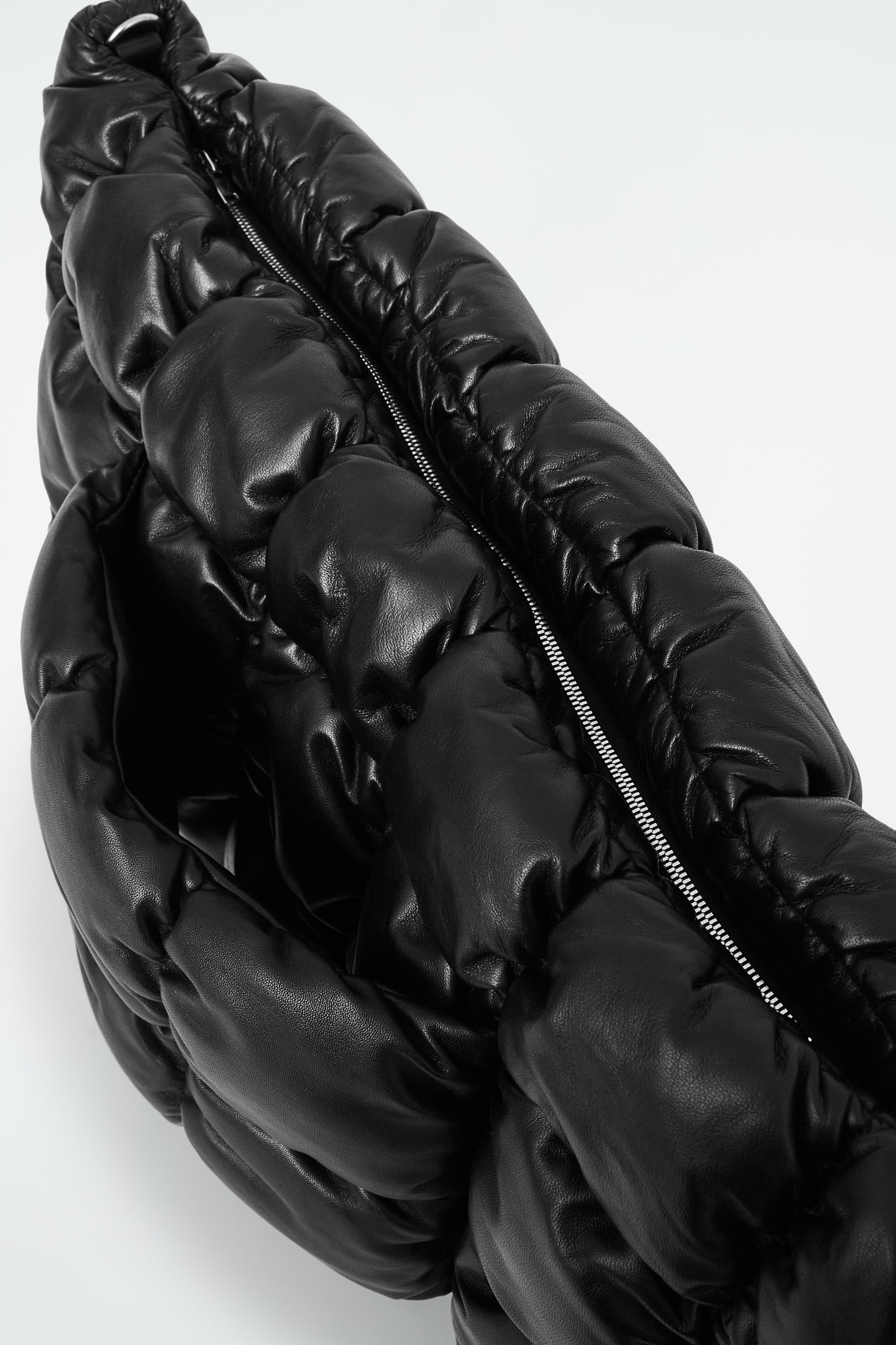 View larger image: PILLOW OVERSIZED QUILTED CLUTCH BAG - LEATHER - BLACK - Ladies | H&M GB 3