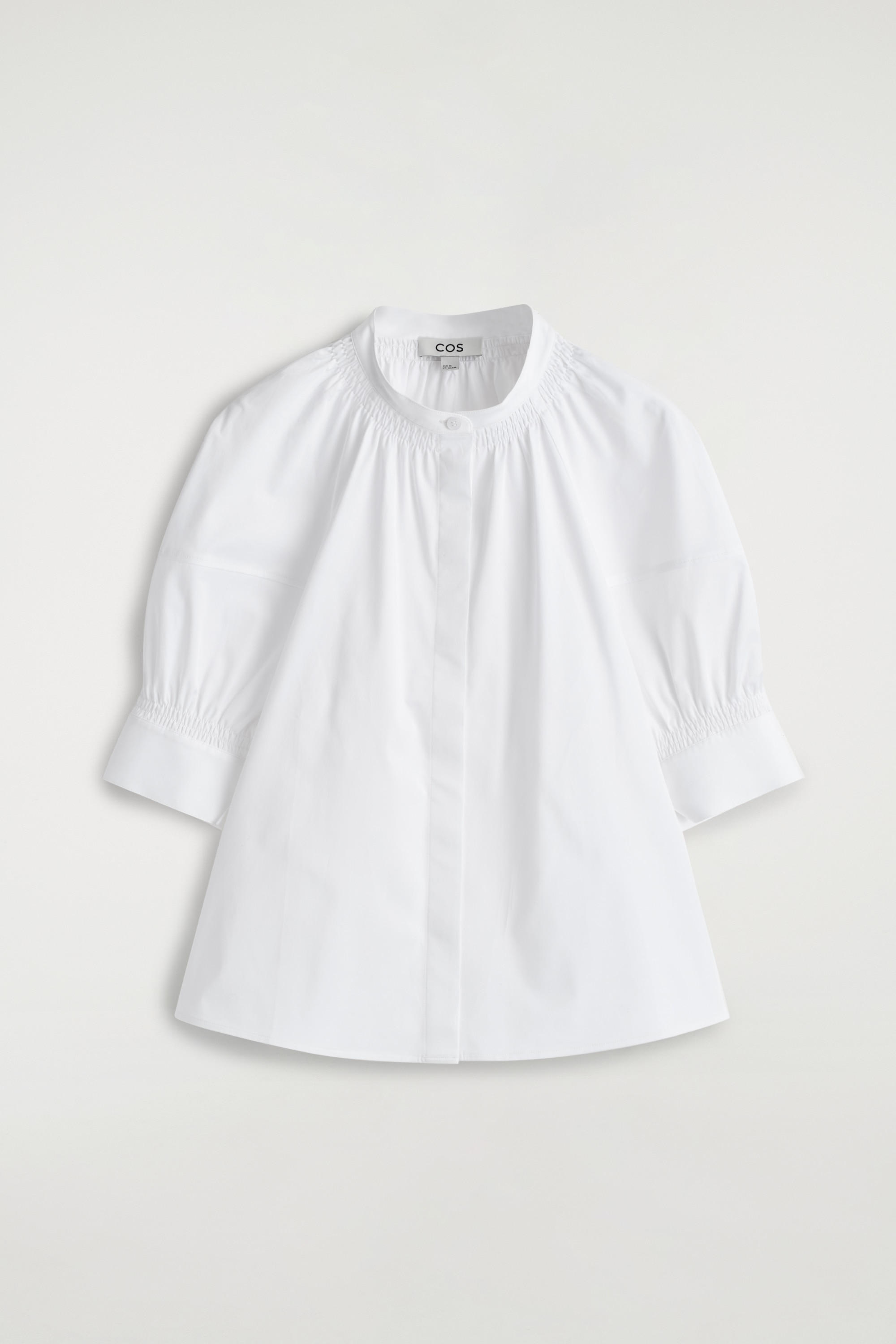 SMOCKED PUFF-SLEEVE BLOUSE - לבן