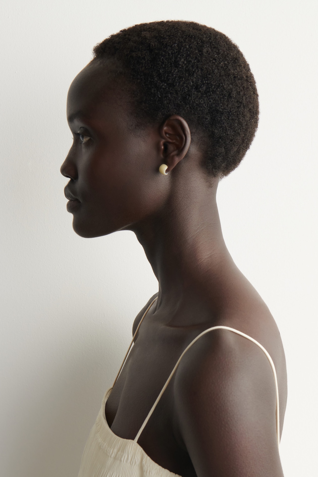 MINI HALF-HOOP EARRINGS — BUTTER YELLOW