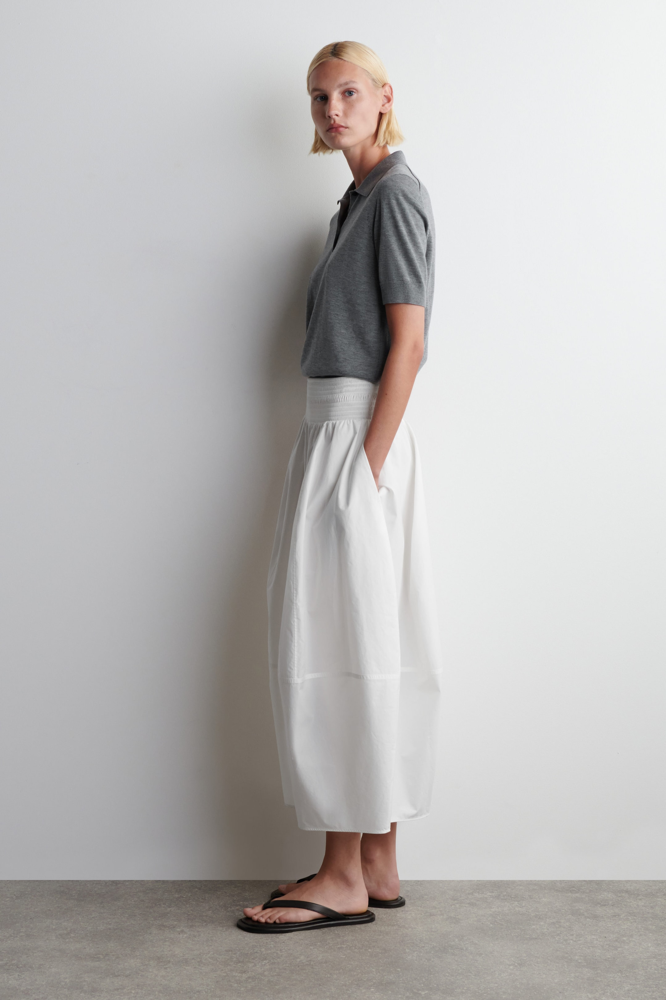 SMOCKED PANELED MIDI SKIRT
