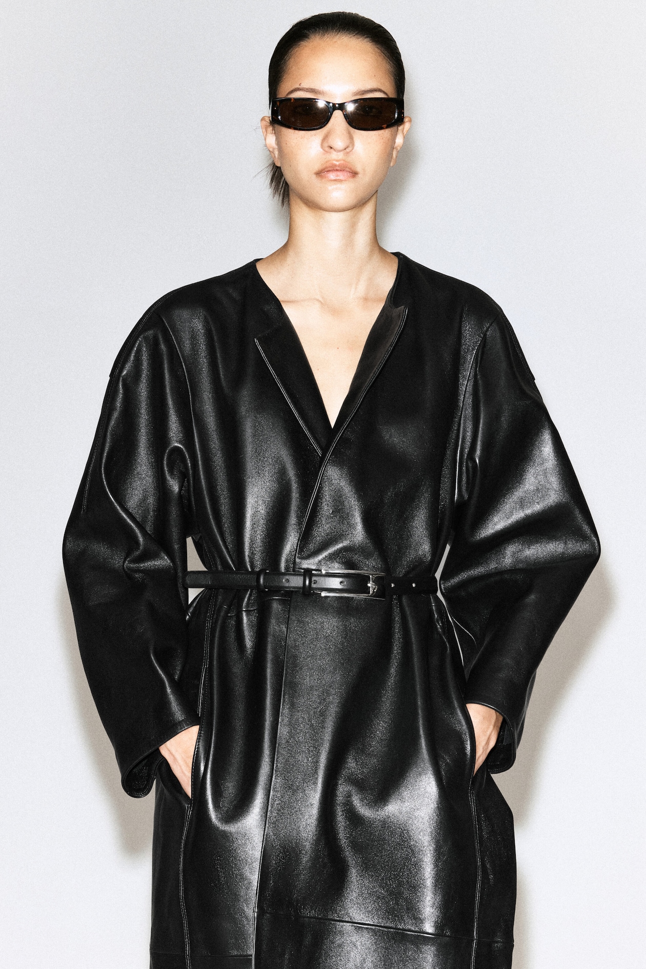 PANELED LEATHER LONG COAT — BLACK