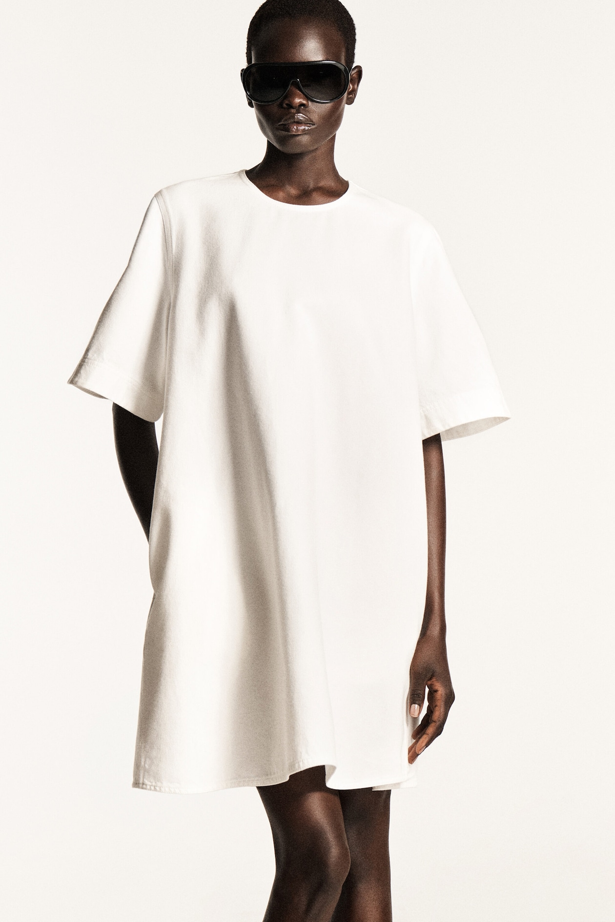 FLARED DENIM MINI DRESS — WHITE