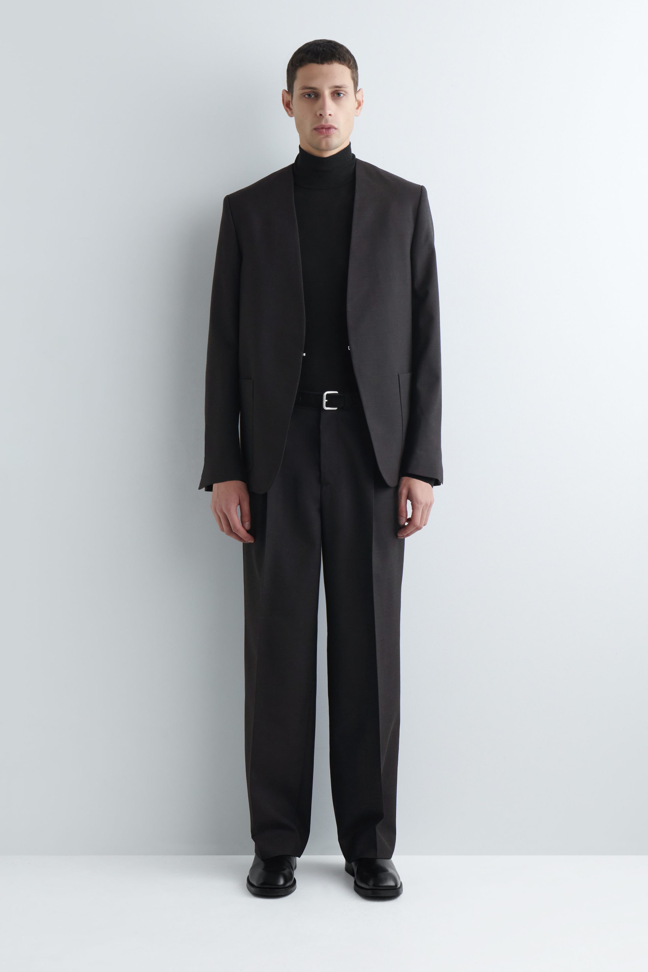 PLEATED WOOL TROUSERS