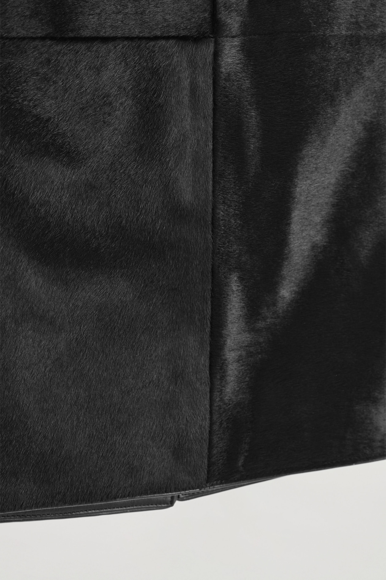 PONY HAIR-EFFECT LEATHER MIDI SKIRT — BLACK