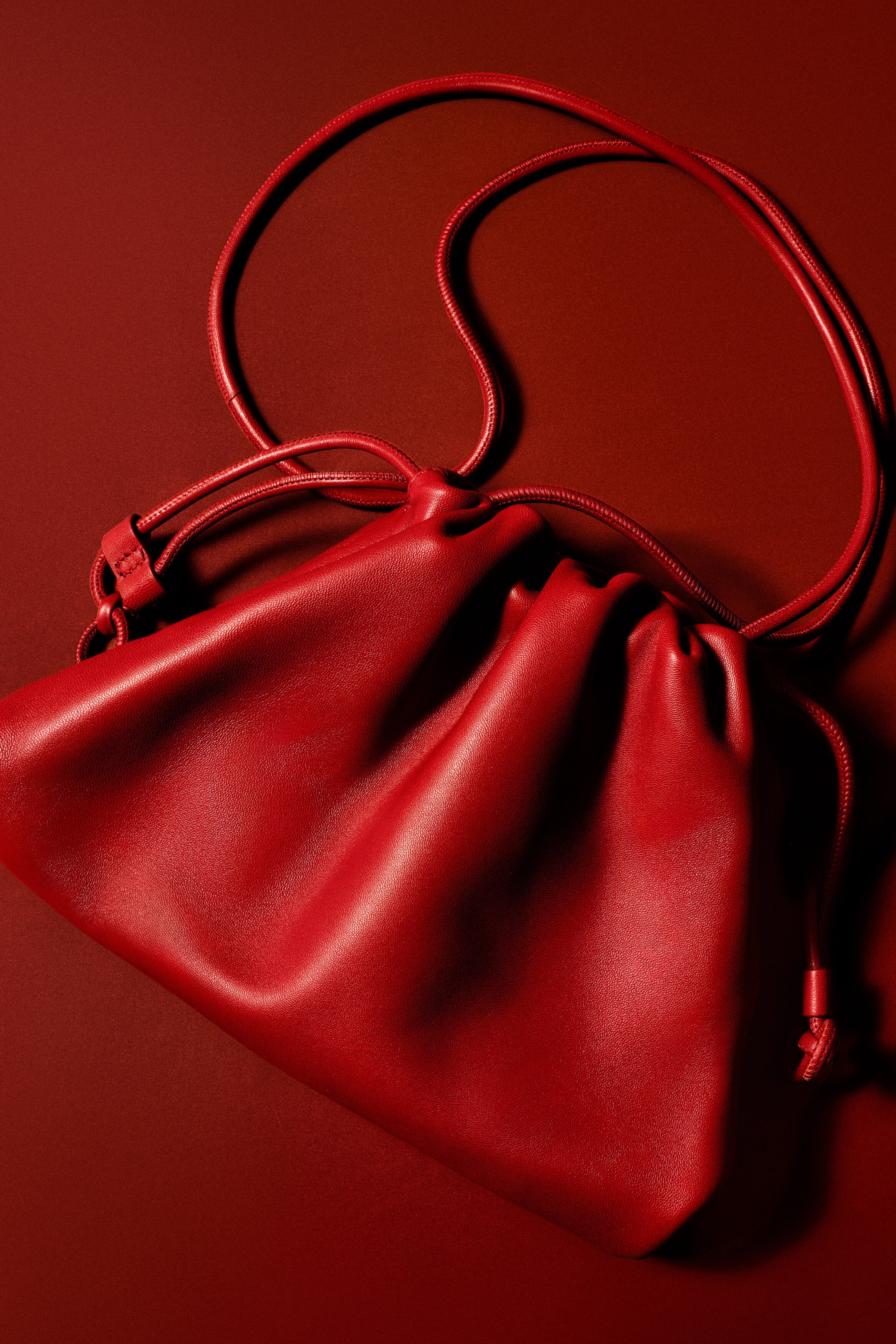 MINI CAVATELLI CLUTCH BAG - LEATHER