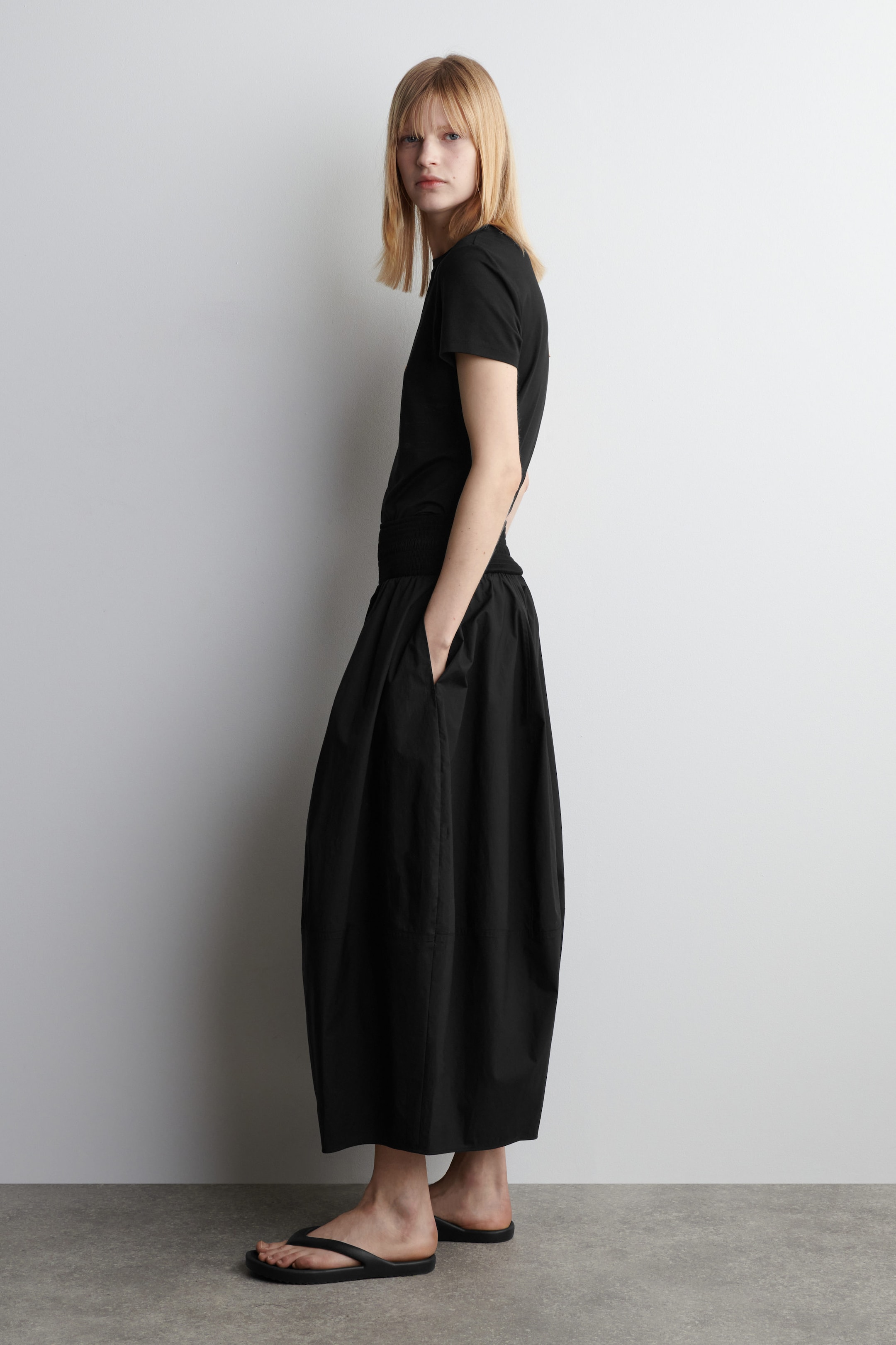 SMOCKED PANELED MIDI SKIRT