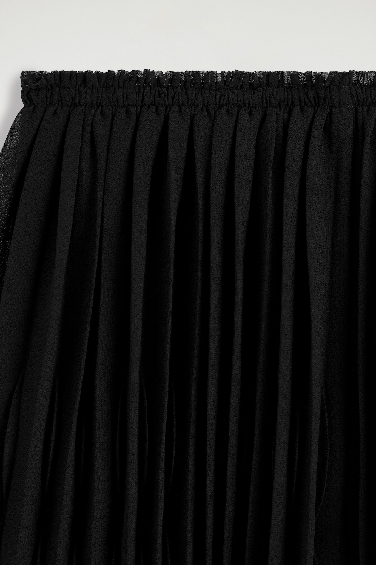 PLEATED GEORGETTE SHORTS — BLACK