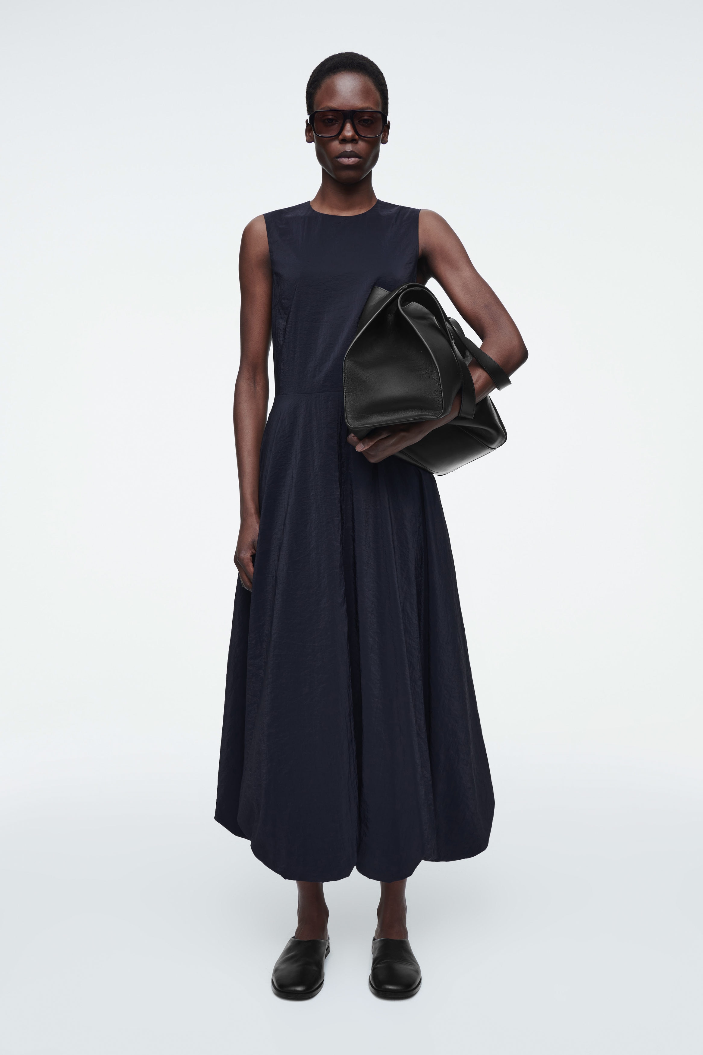 SLEEVELESS BUBBLE-HEM MIDI DRESS - NAVY | COS