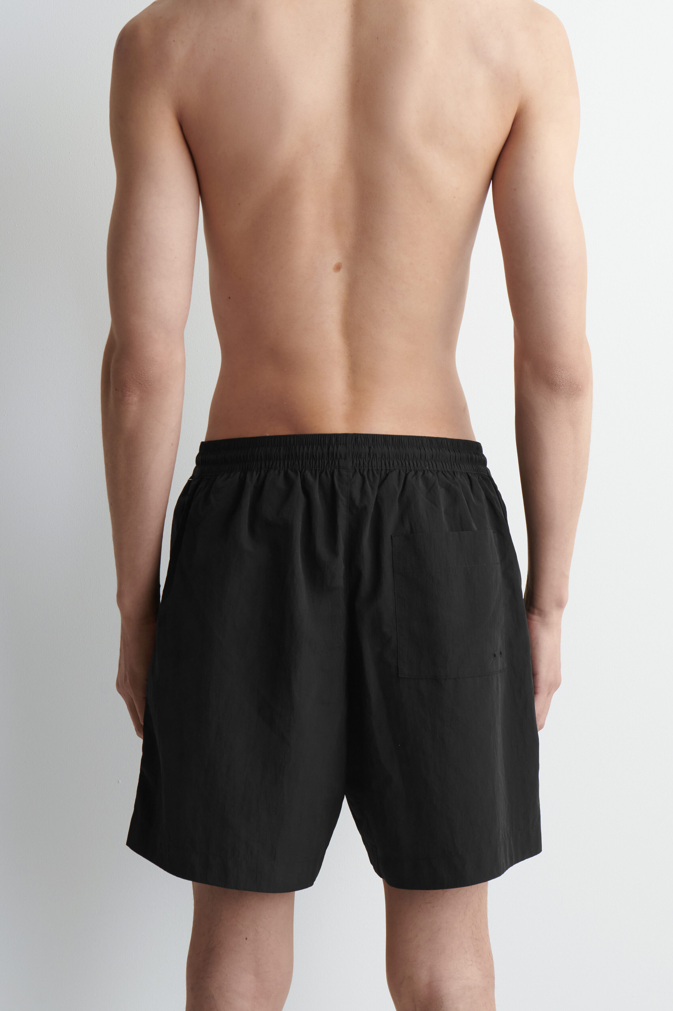 NYLON WIDE-LEG DRAWSTRING SWIM SHORTS - BLACK | COS US