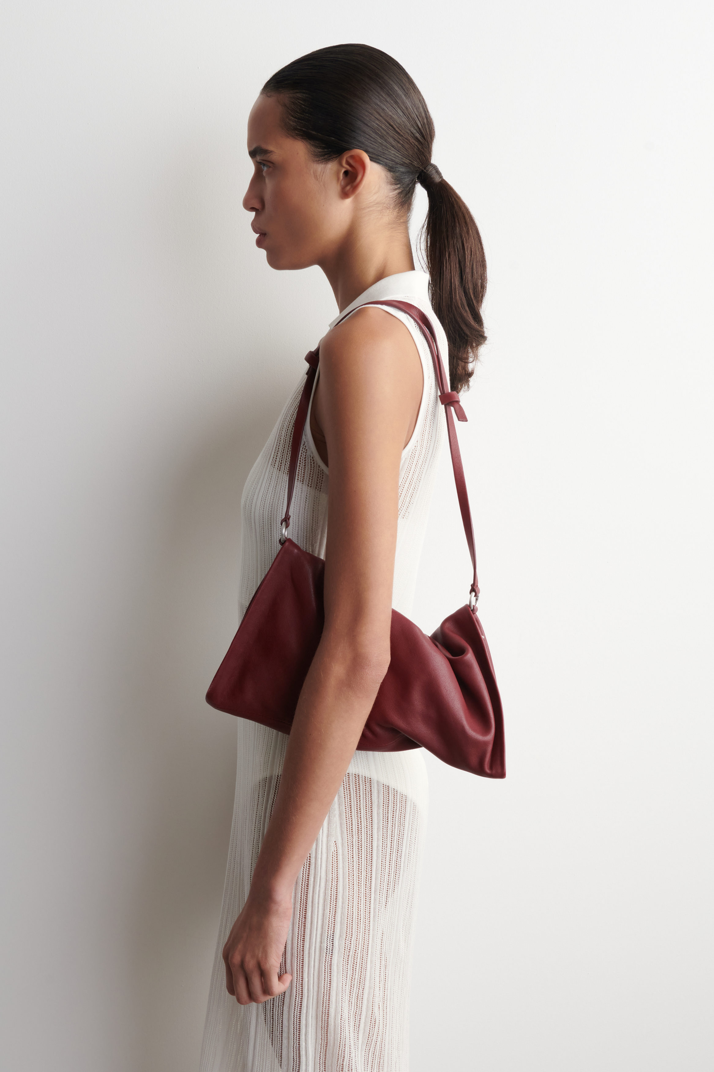 TWISTED MINI CLUTCH BAG - LEATHER - CRIMSON | COS US