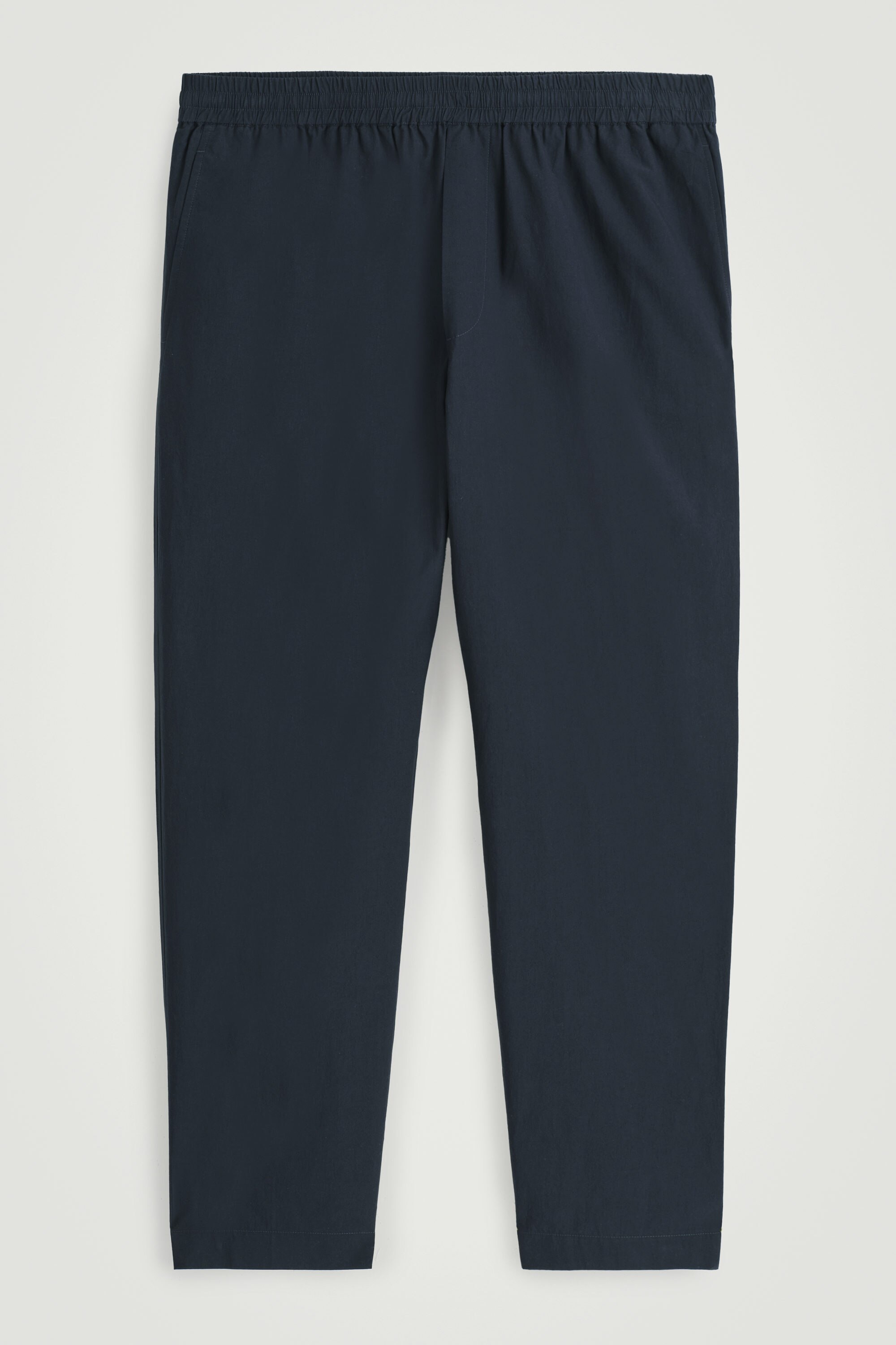 ELASTICATED COTTON TAPERED TROUSERS - NAVY | COS