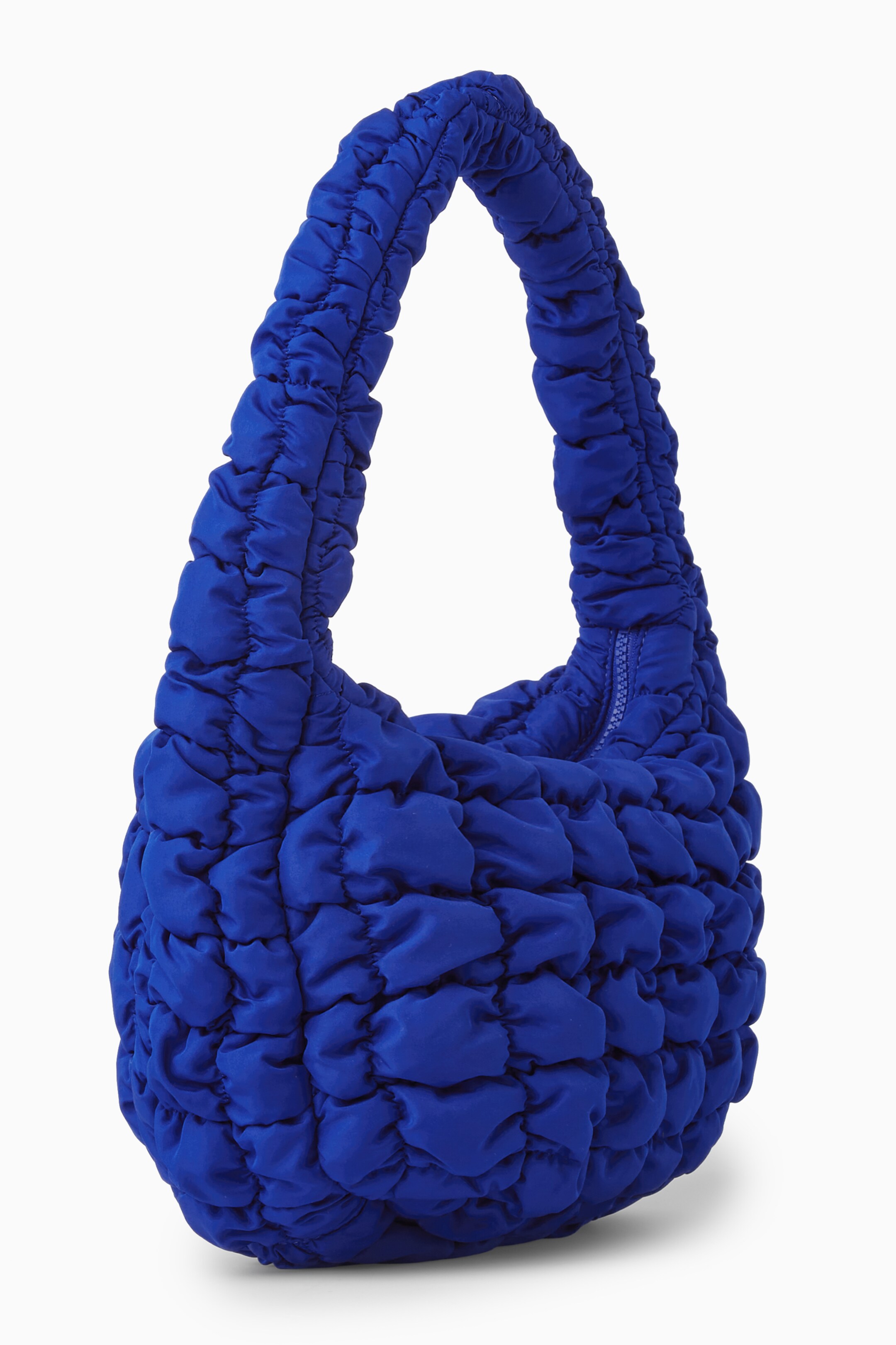 Zobacz większy obraz: PIKOWANA MINI TOREBKA - BLUE - ONA | H&M PL 1