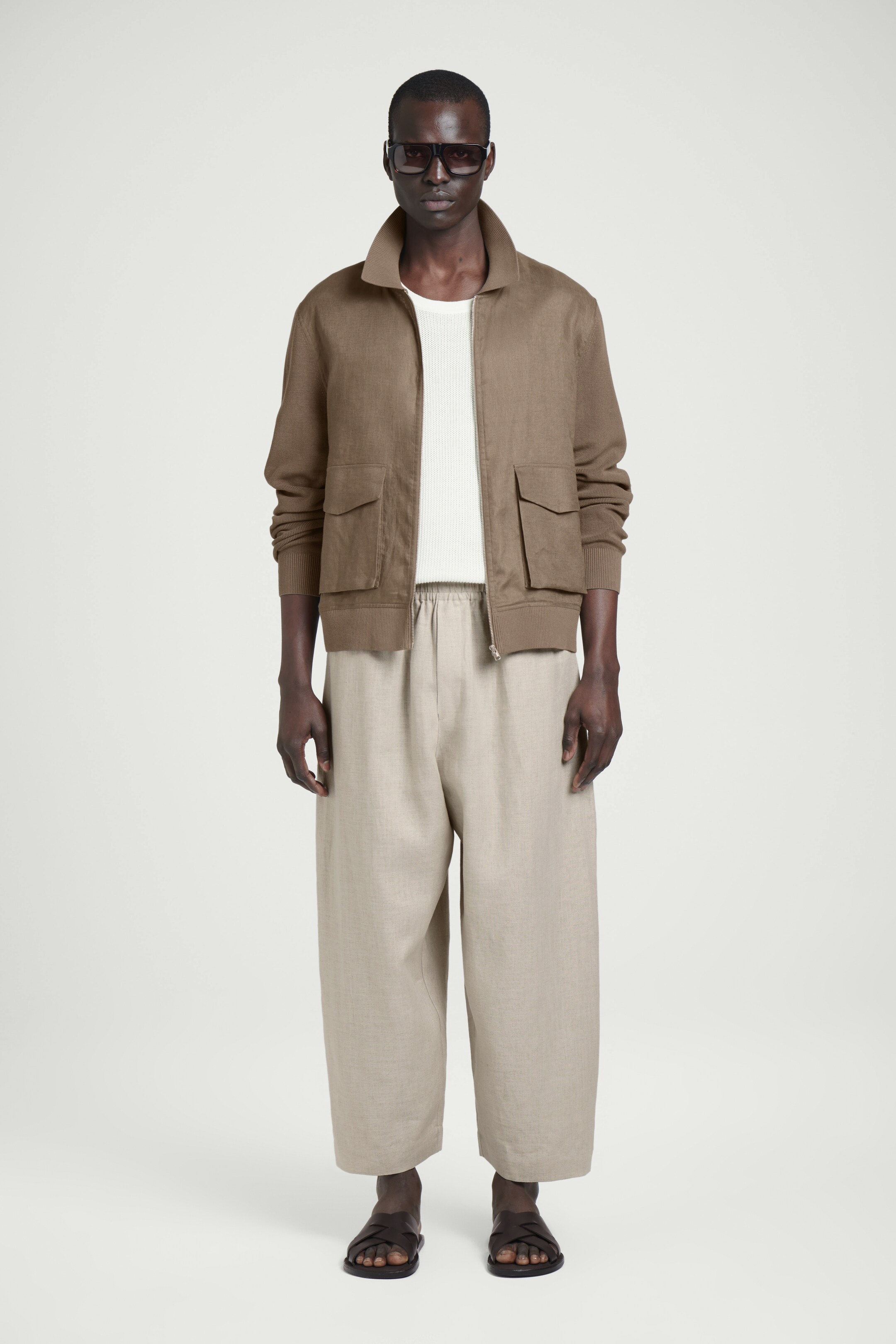 Visualizza immagine più grande: PANTALONI A GAMBA LARGA IN LINO VITA ELASTICIZZATA - NON TINTO / BEIGE - UOMO | H&M IT 3