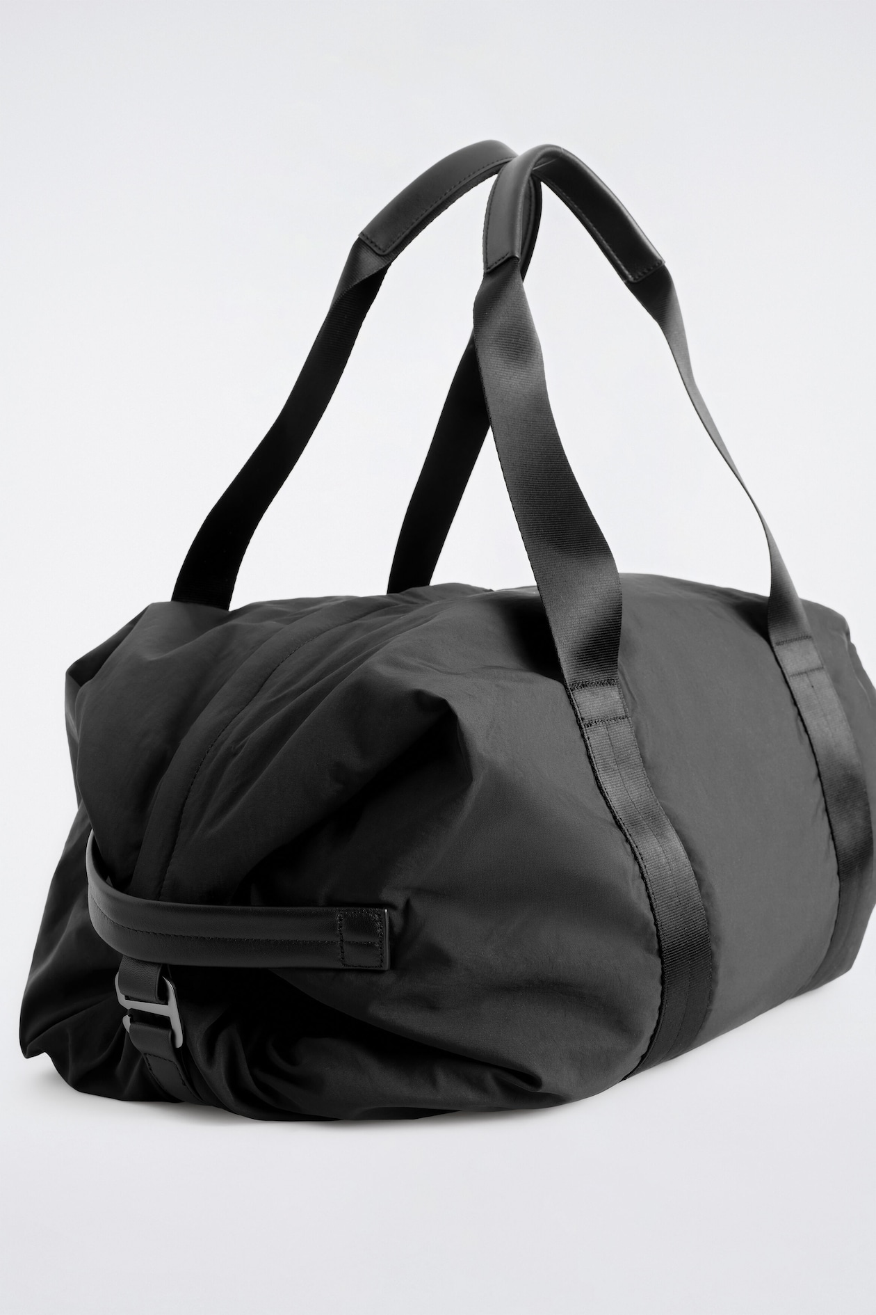 LEATHER-DETAIL DUFFEL BAG - NYLON — BLACK