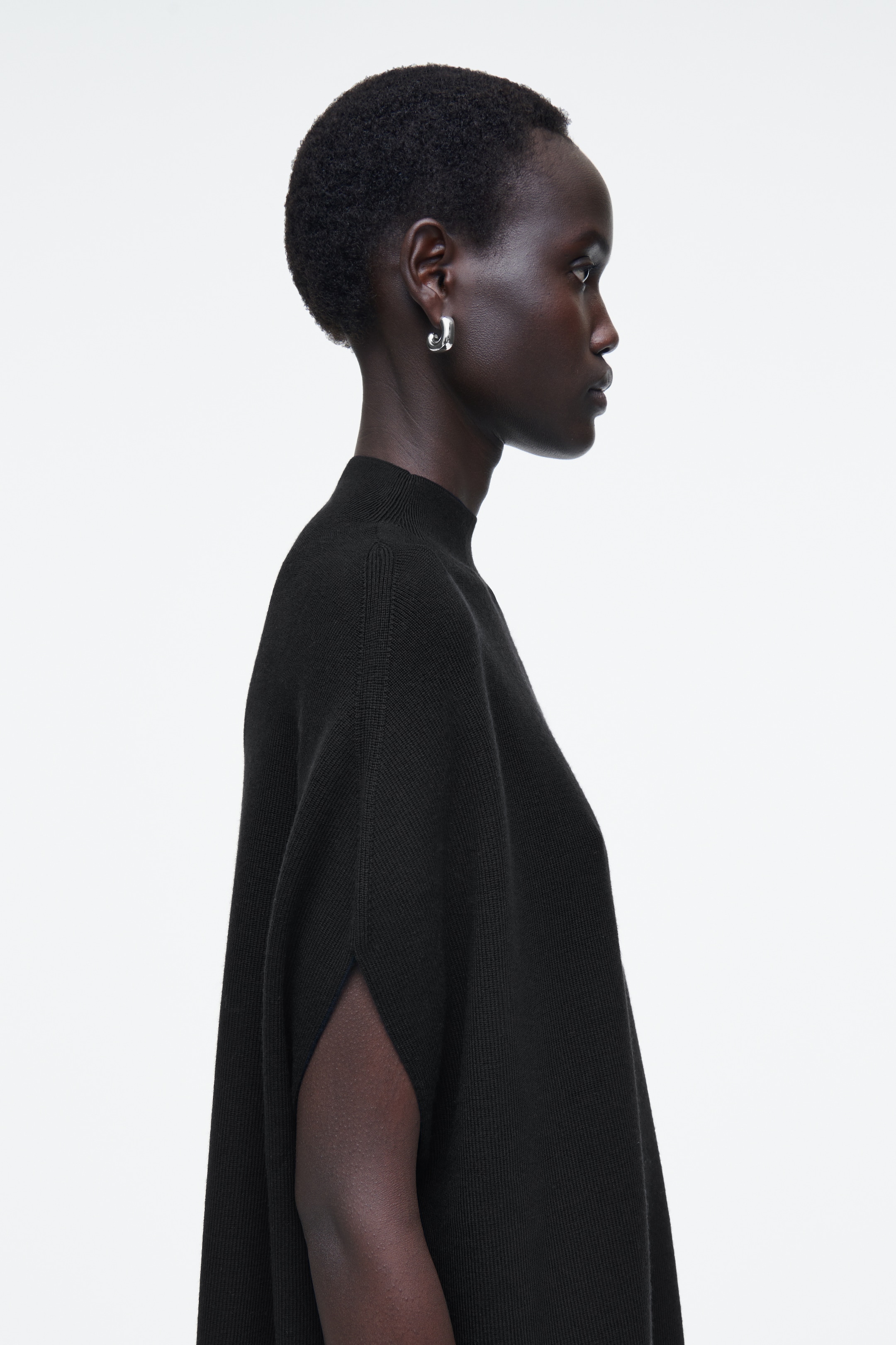 Ver imagen más grande: VESTIDO ENVOLVENTE DE LANA - NEGRO - MUJER | H&M ES 5