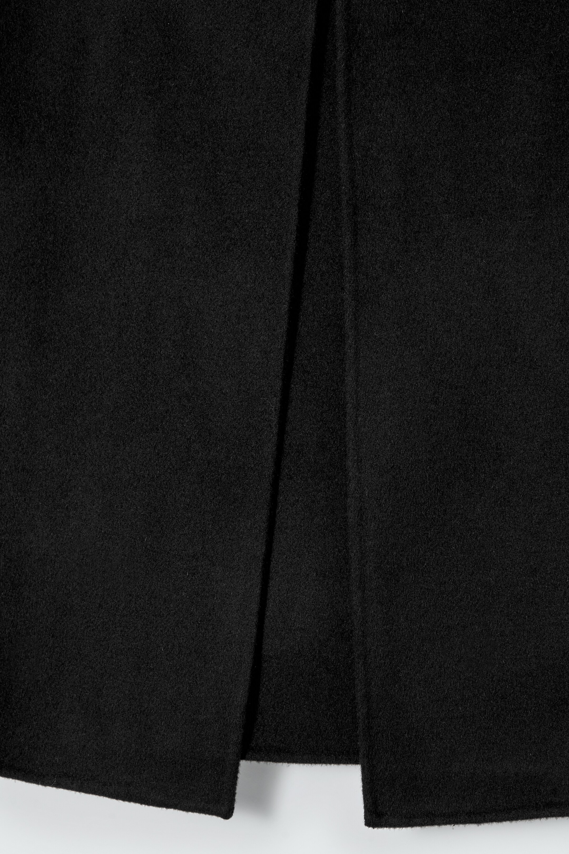 Näytä suurempi kuva: FOLD-DETAIL DOUBLE-FACED WOOL MINI SKIRT - BLACK - NAISET | H&M FI 5