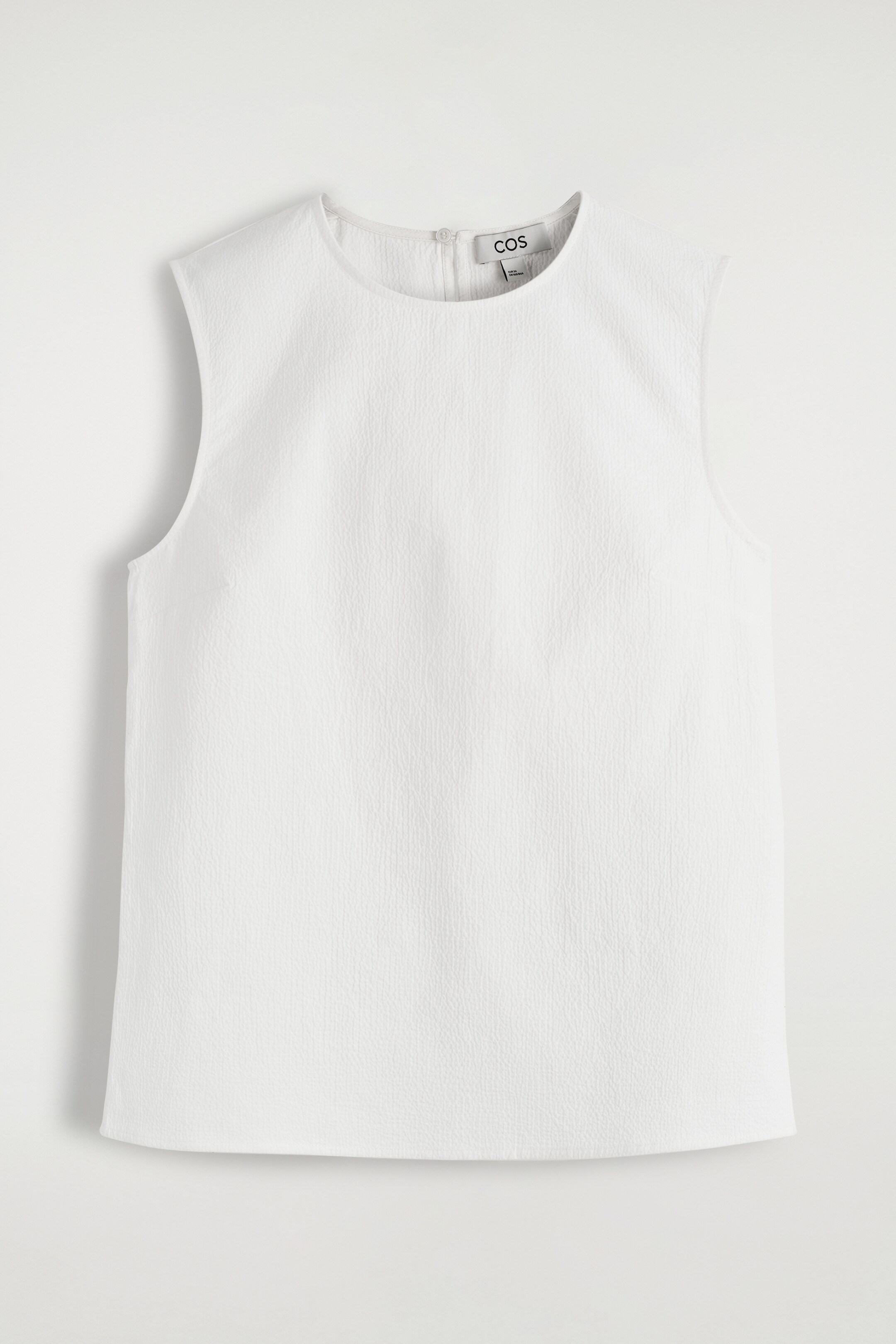 Visa större bild: ÄRMLÖS TOPP I BOMULLS-SEERSUCKER - VIT - DAM | H&M SE 6