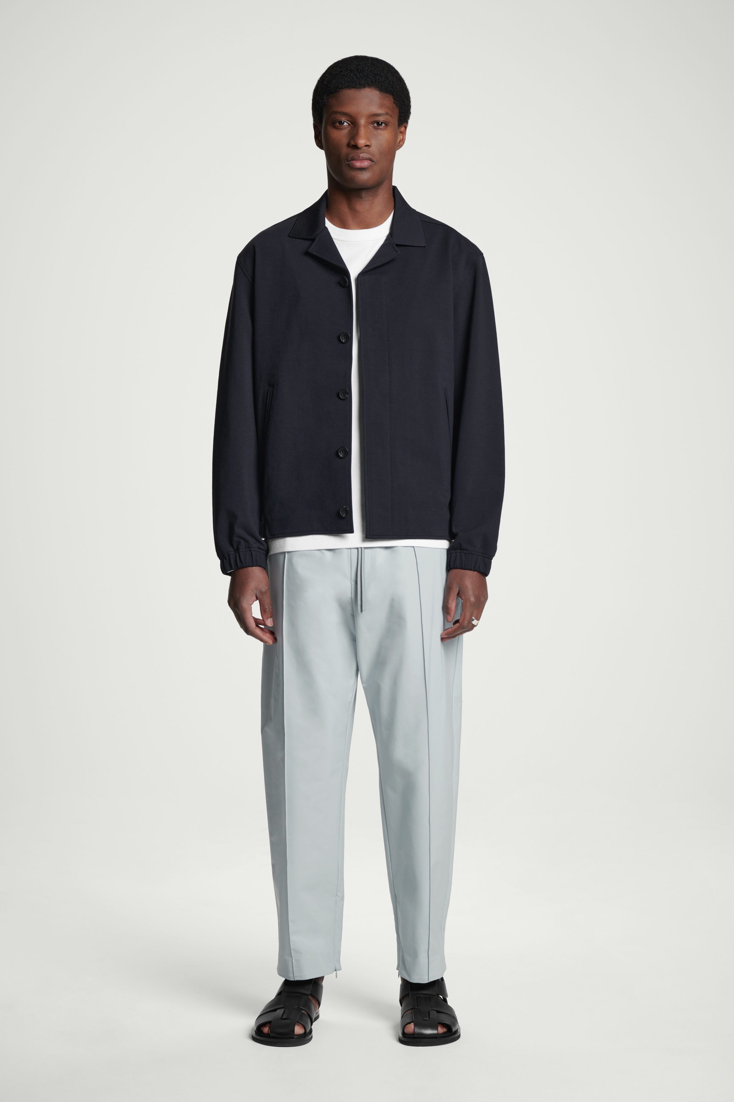PINTUCKED TAPERED TRACK PANTS - GRAY | COS