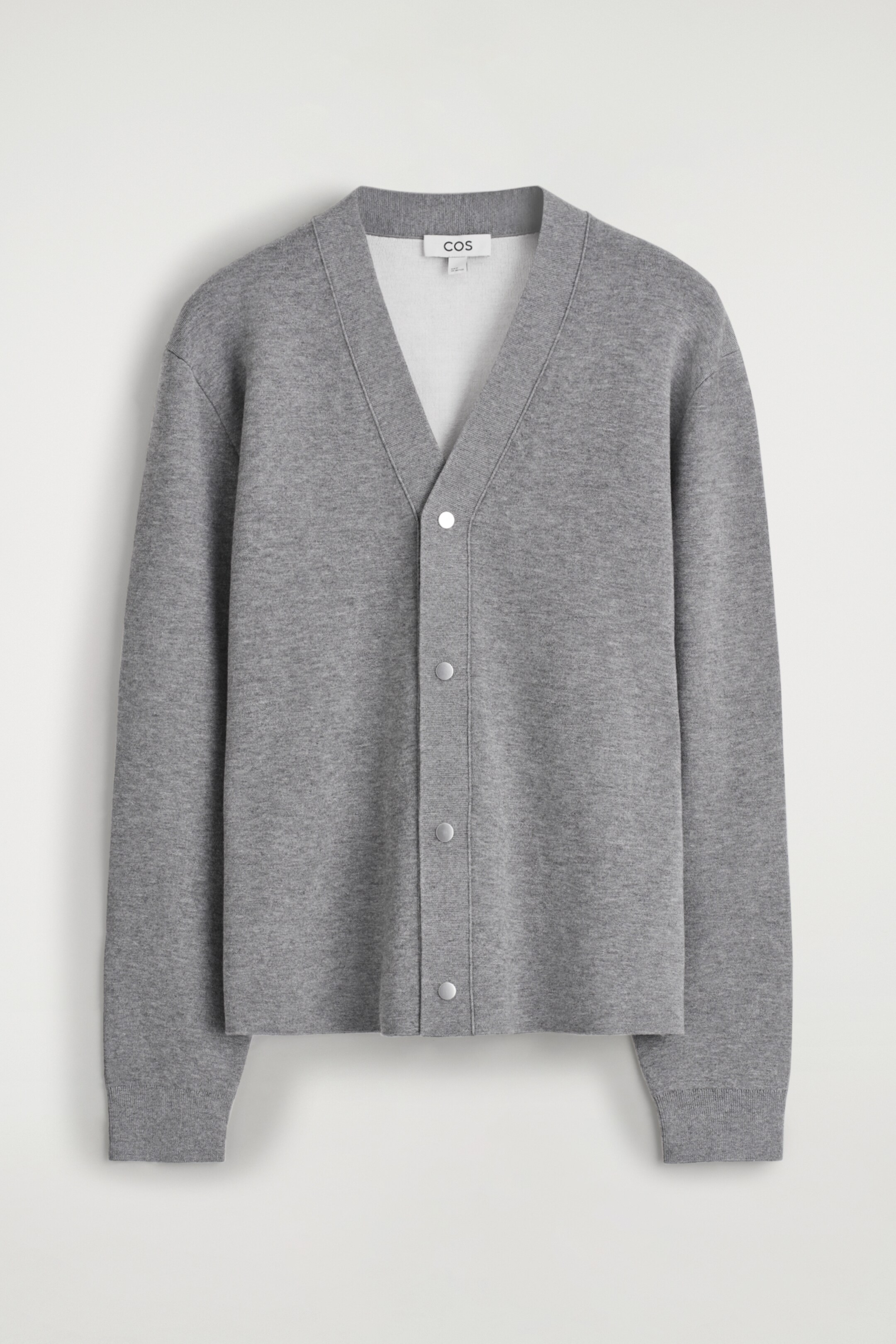 Visa större bild: DUBBELSIDIG STICKAD KOFTA - GRÅMELERAD - HERR | H&M SE 6