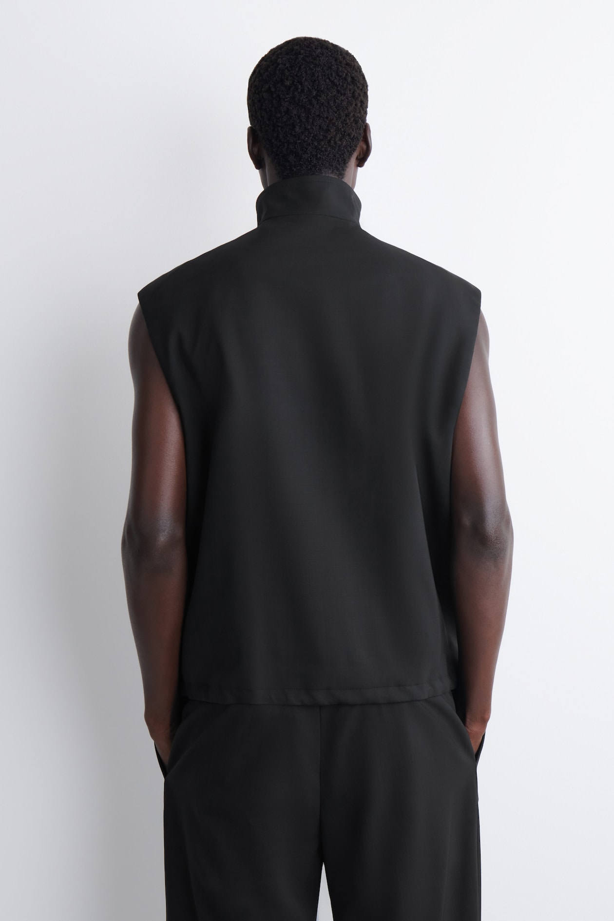 TAILORED FUNNEL-NECK WOOL GILET — CARBON