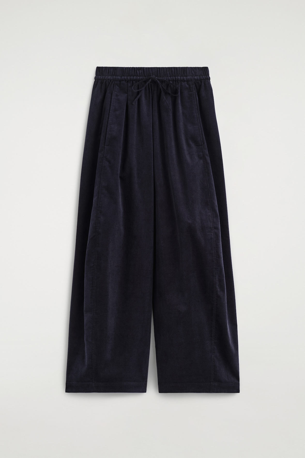 ELASTICATED CORDUROY BARREL-LEG TROUSERS — NAVY