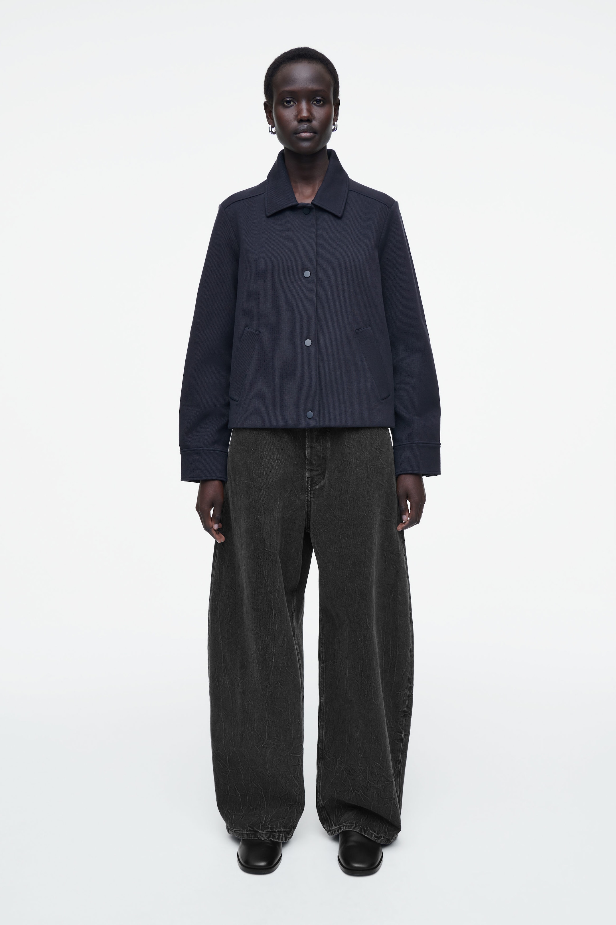 CHAQUETA FUNCIONAL CON FORMA DE TRAPECIO