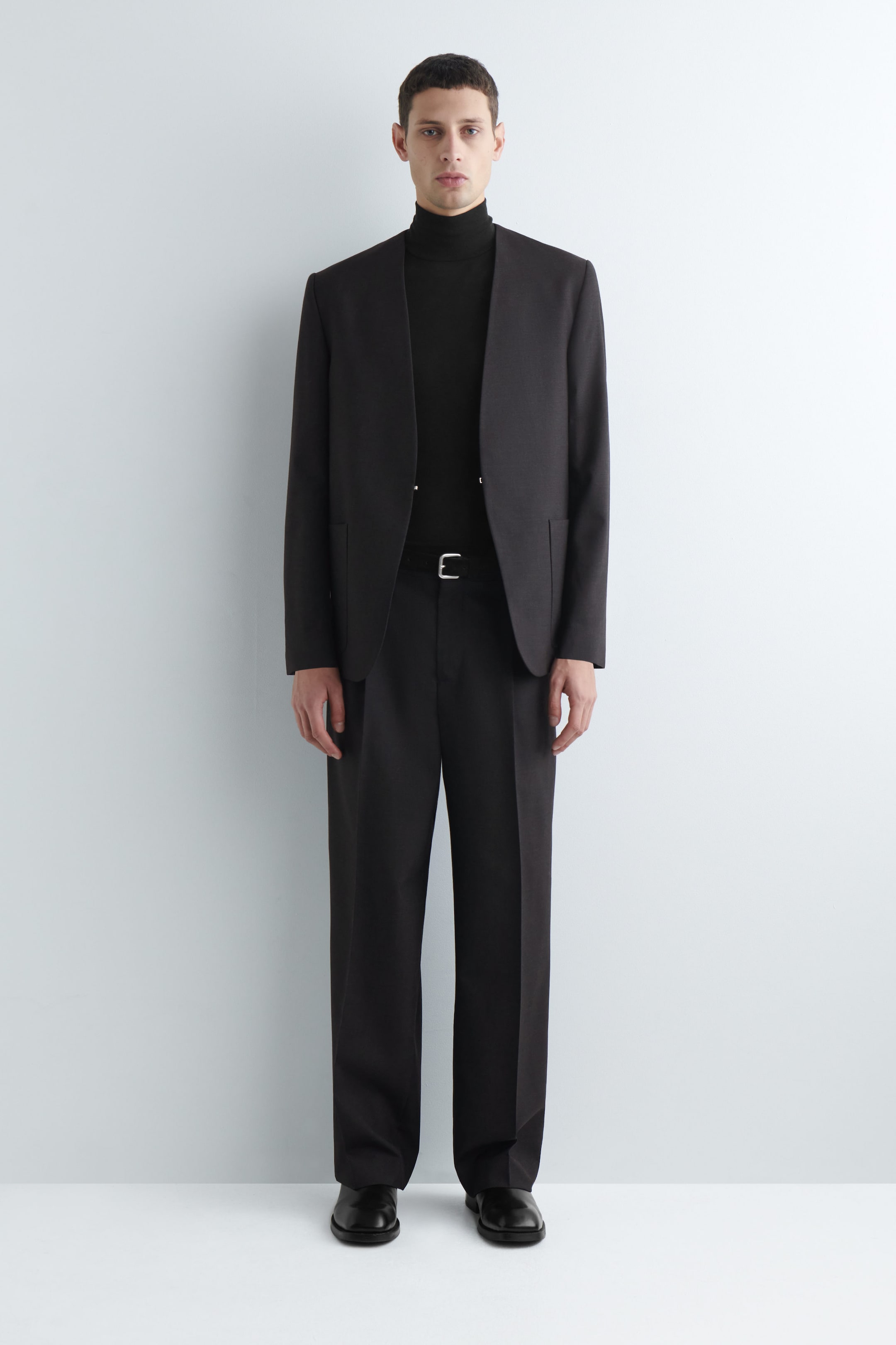 PLEATED WOOL TROUSERS