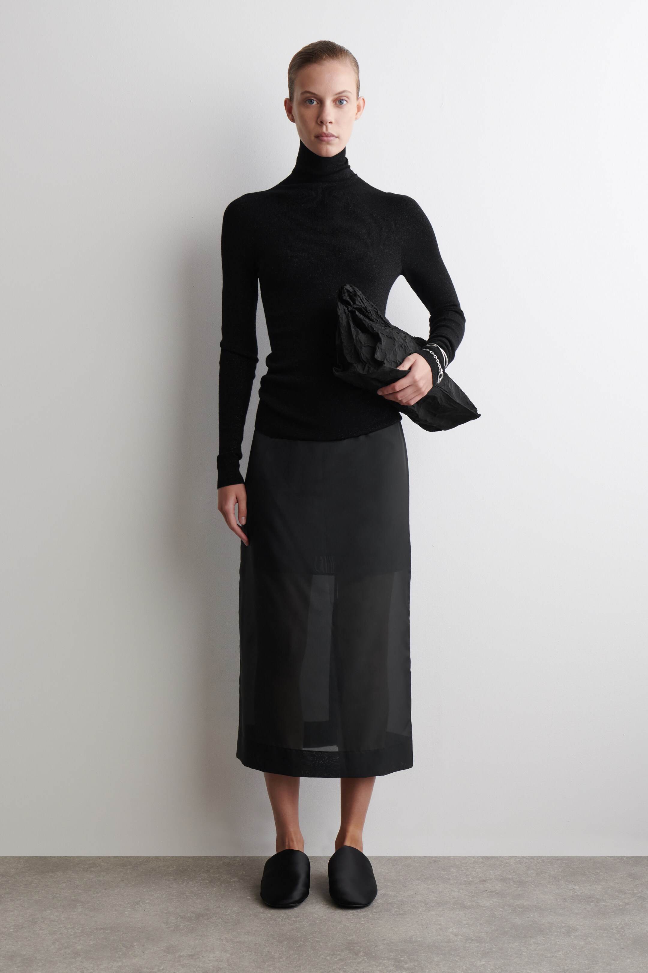 Visualizza immagine più grande: TOP IN LANA SCINTILLANTE SENZA CUCITURE - NERO - DONNA | H&M IT 2