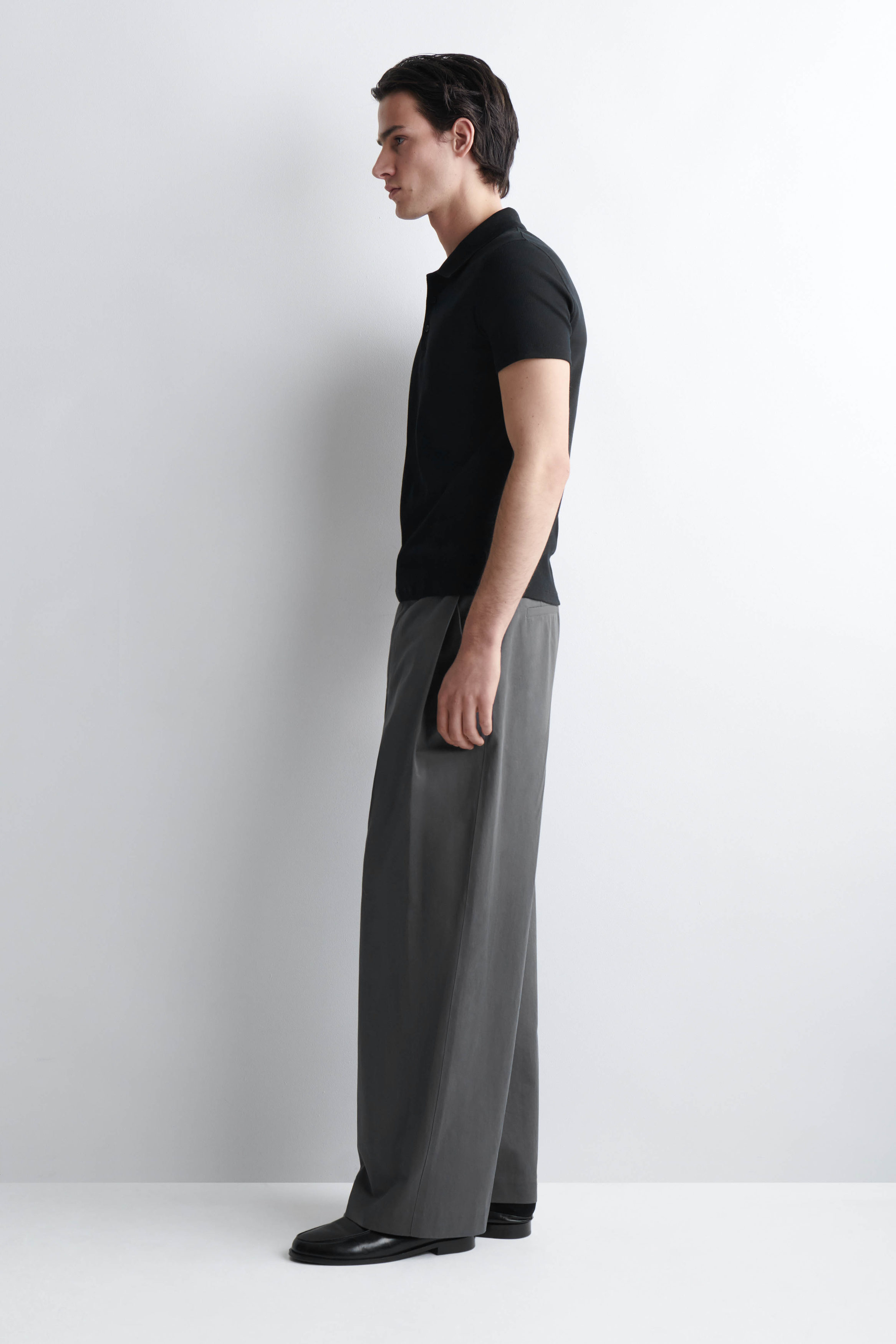SLIM RIBBED COTTON POLO SHIRT - BLACK | COS US