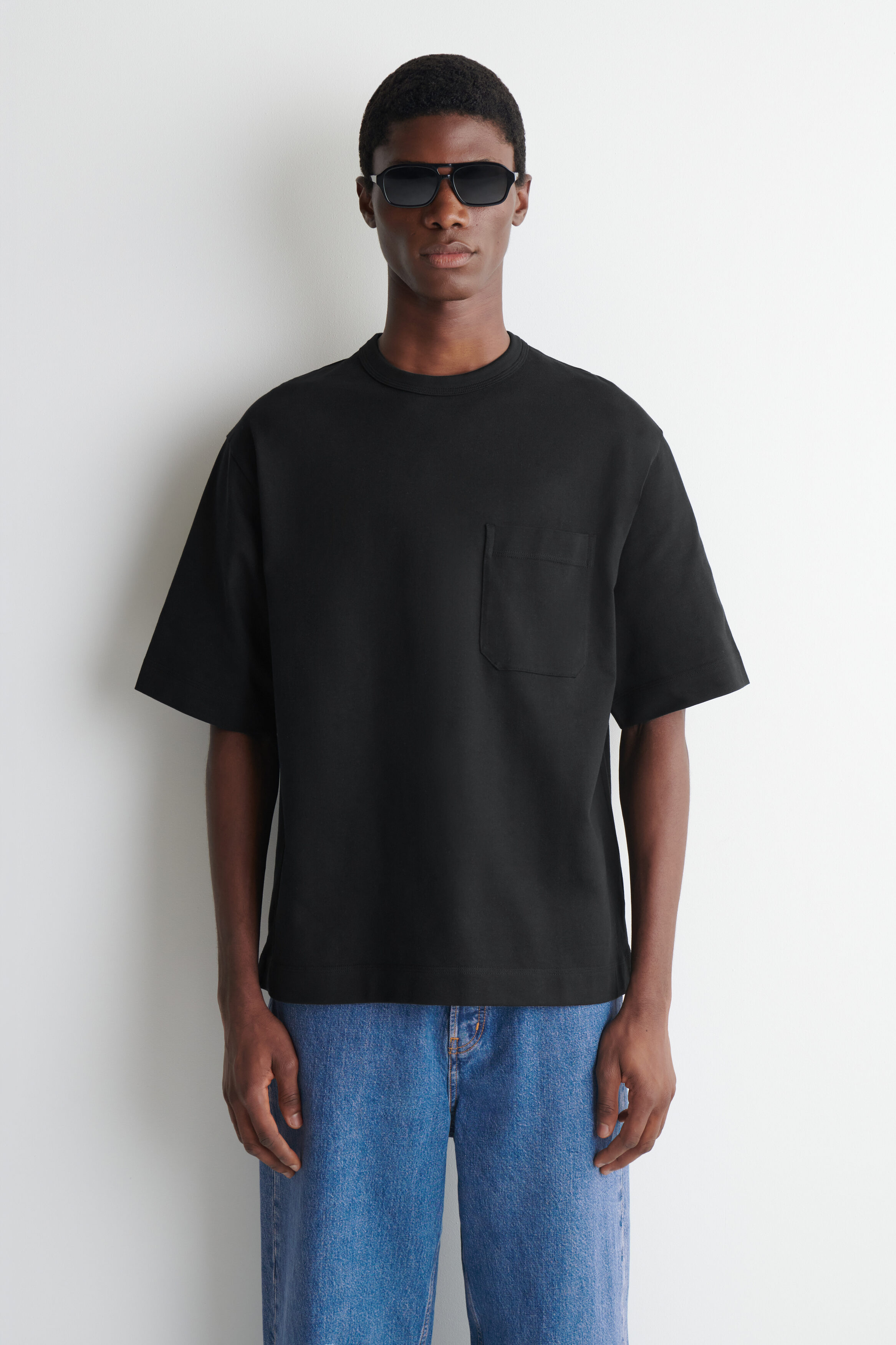 OVERSIZED POCKET-DETAIL T-SHIRT - BLACK | COS US