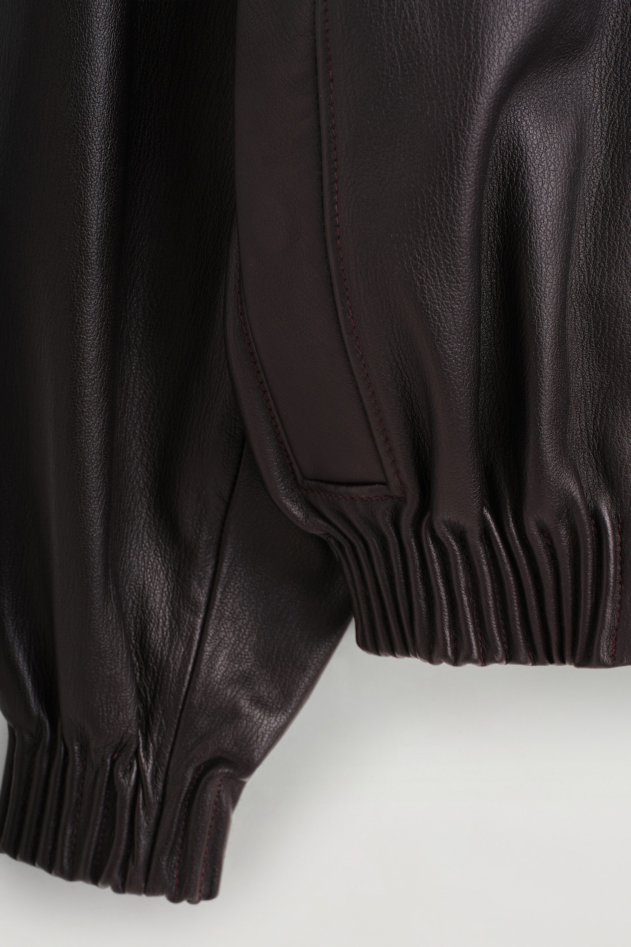 LEATHER MOCK-NECK BOMBER JACKET — DARK BROWN