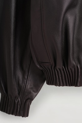 LEATHER MOCK-NECK BOMBER JACKET — DARK BROWN 7