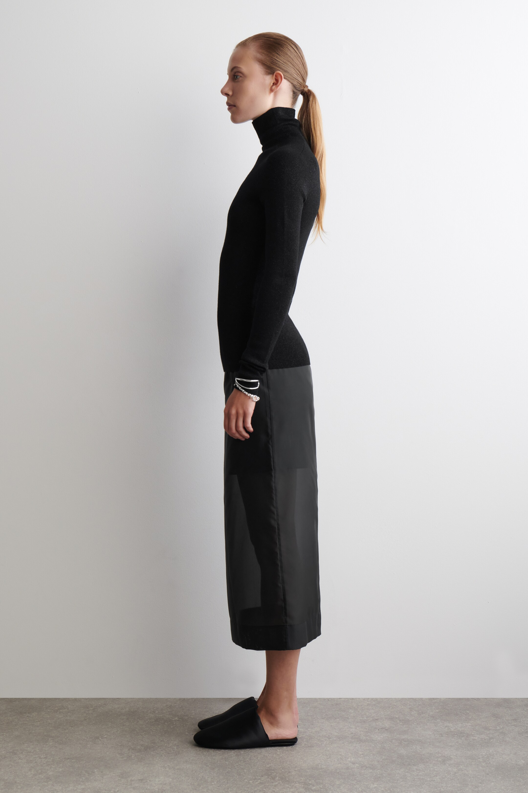 Visualizza immagine più grande: TOP IN LANA SCINTILLANTE SENZA CUCITURE - NERO - DONNA | H&M IT 3