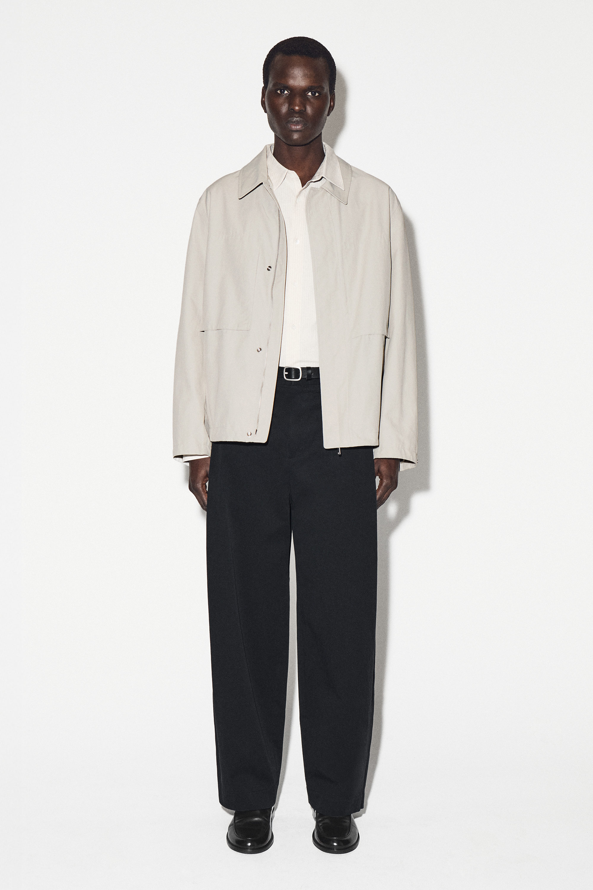 PLEATED COTTON RELAXED-FIT WIDE-LEG TROUSERS - BLACK | COS