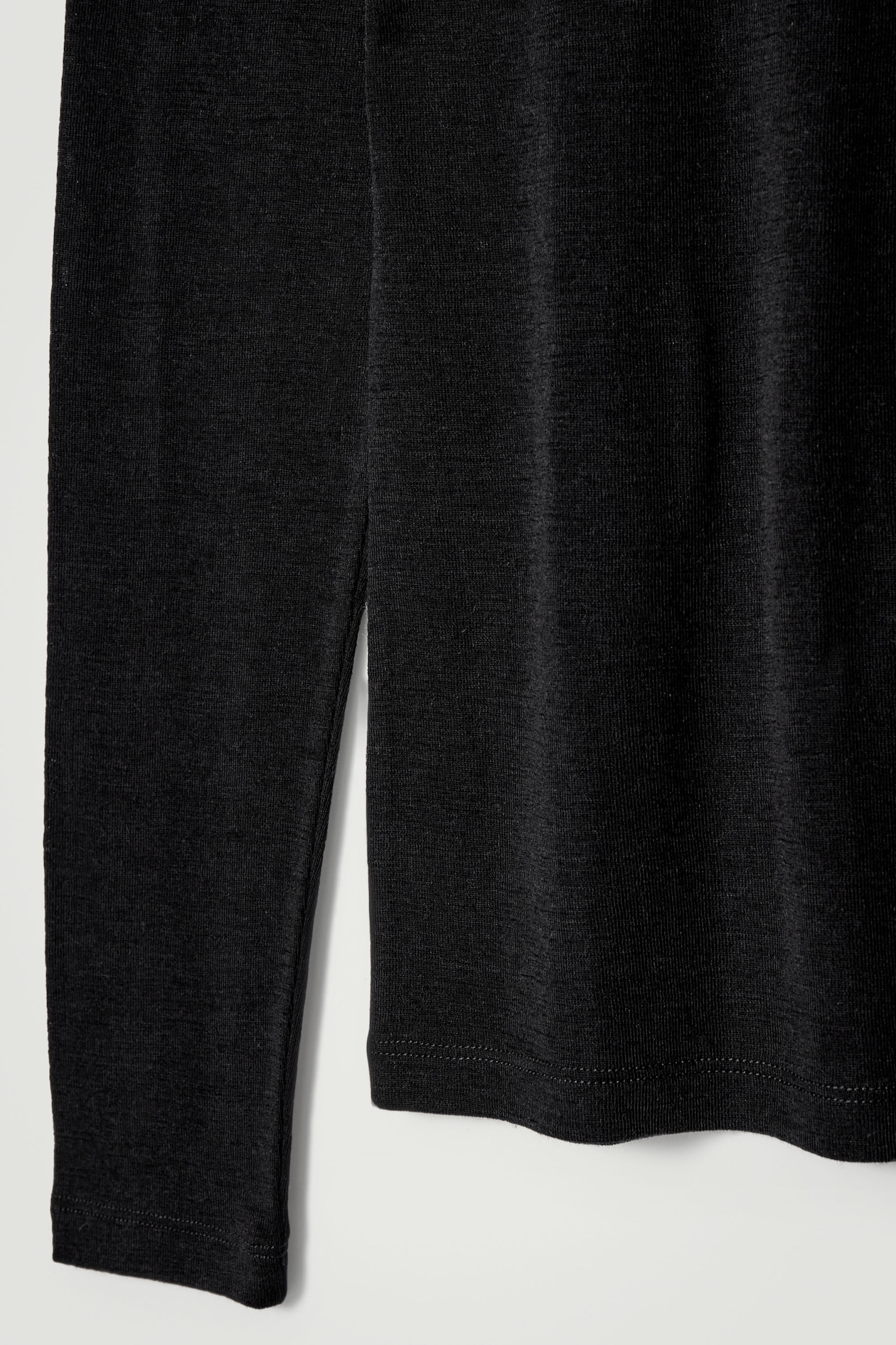 SLIM WOOL-JERSEY ROLLNECK TOP — BLACK