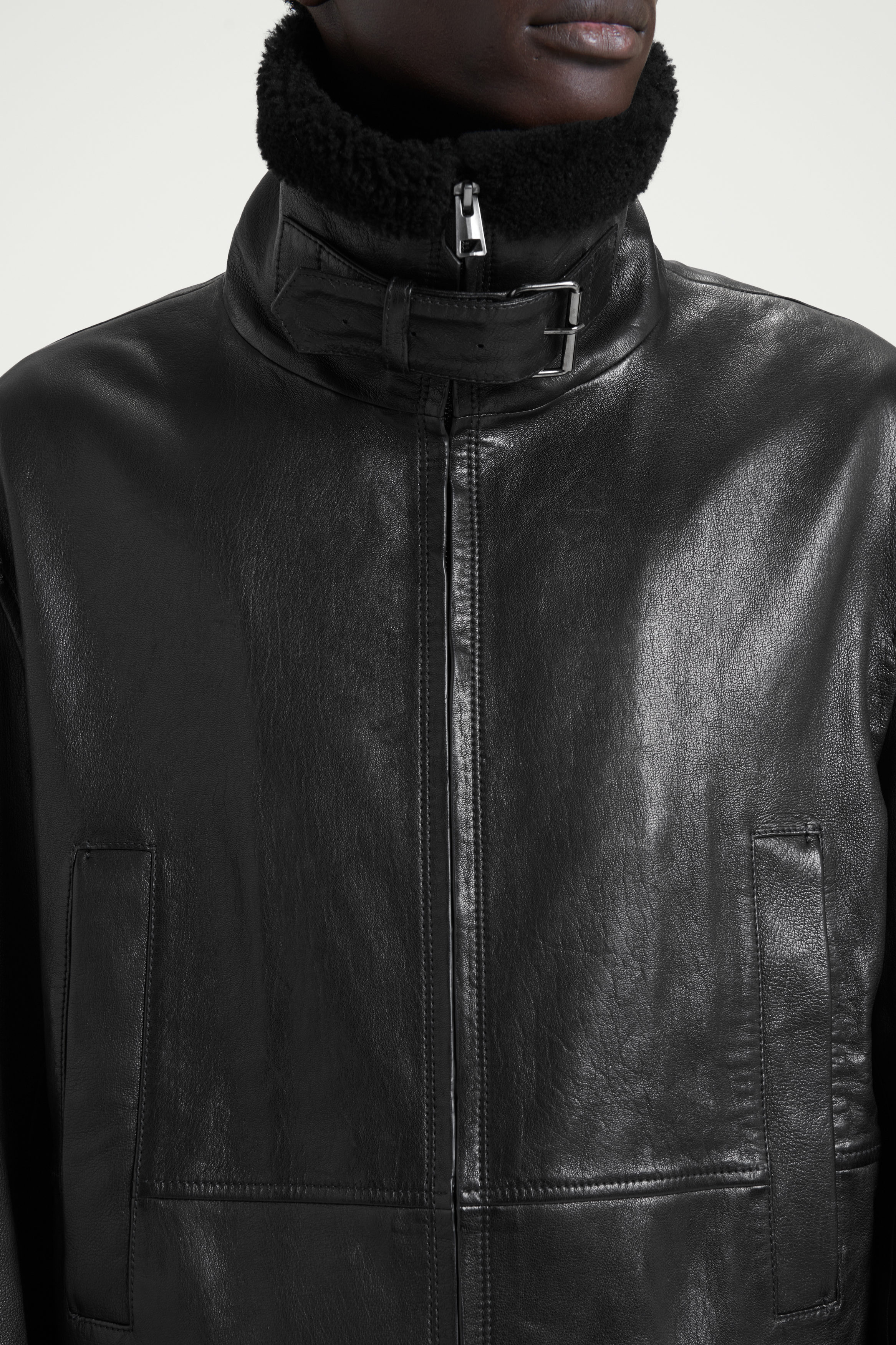 THE SHEARLING-TRIMMED LEATHER JACKET - CARBON | COS