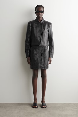 CROC-EFFECT LEATHER MINI WRAP SKIRT — BLACK 1